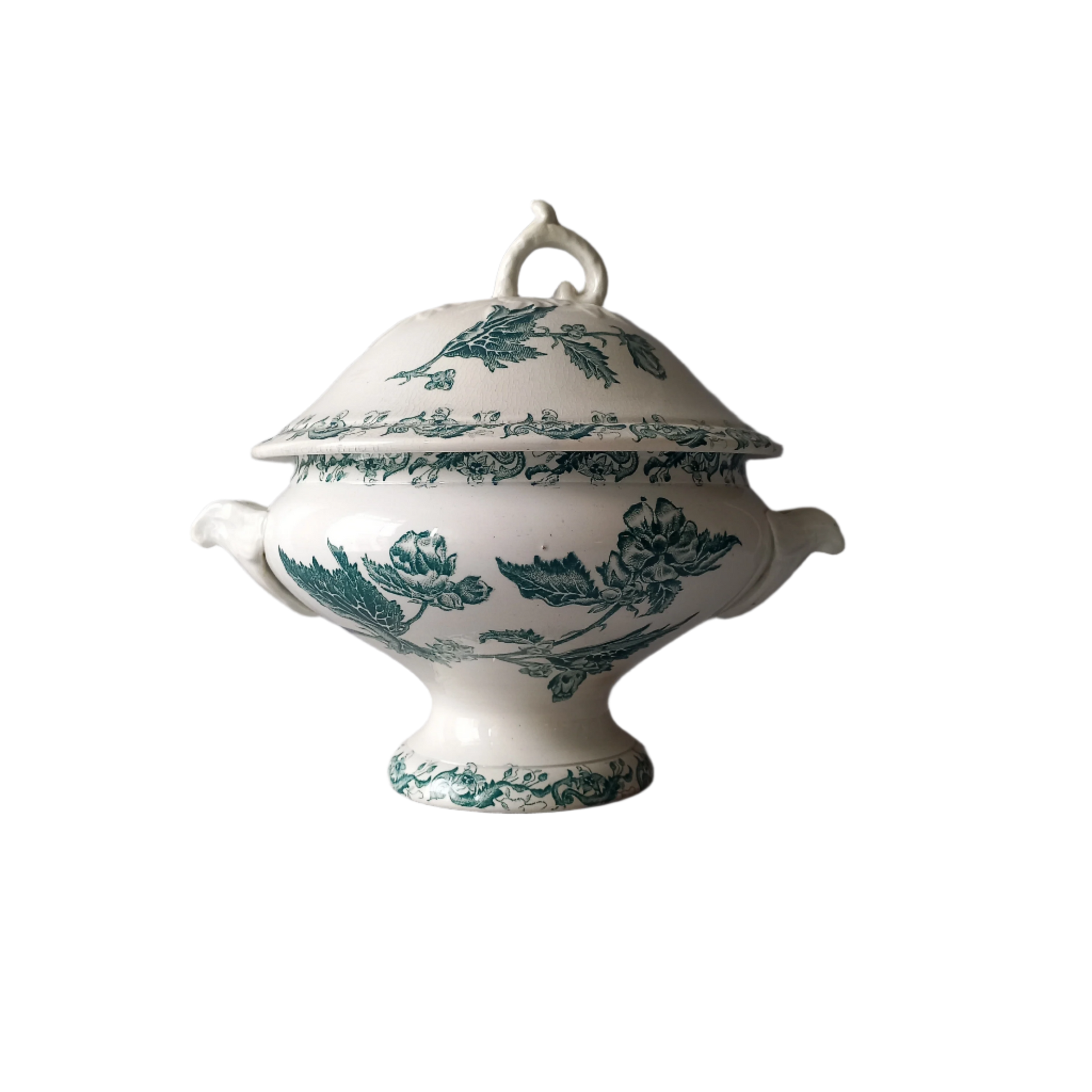 A delightful small-sized antique ironstone soup tureen by French manufacturer, St. Amand. This tureen is adorned with a beautiful teal coloured floral transferware pattern and has a splendid little handle on the lid. In summary, an elegant piece with just enough patina of age to give it character.