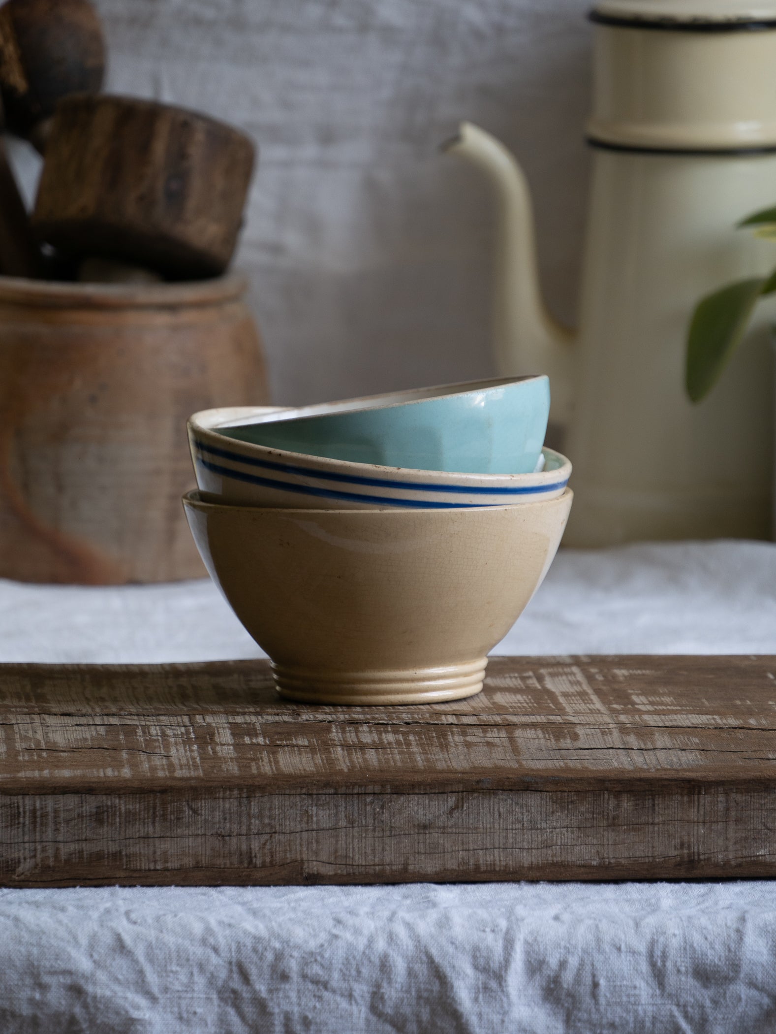 Three authentic French café-au-lait bowls in gently worn condition. Stack them for a slow weekend breakfast display, line them on an open shelf, or fill each with seasonal fruit for an easy pop of colour.