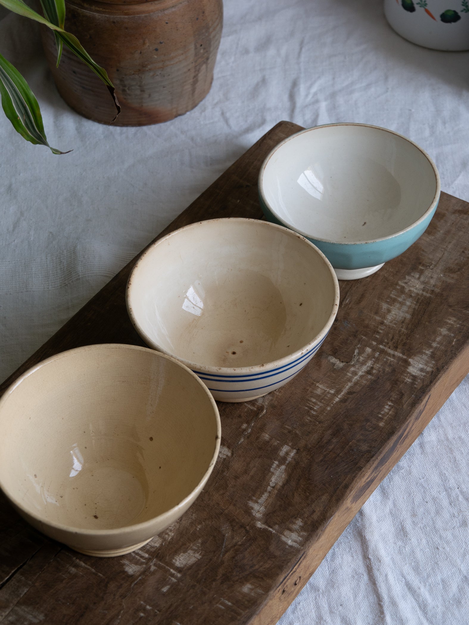Three authentic French café-au-lait bowls in gently worn condition. Stack them for a slow weekend breakfast display, line them on an open shelf, or fill each with seasonal fruit for an easy pop of colour.
