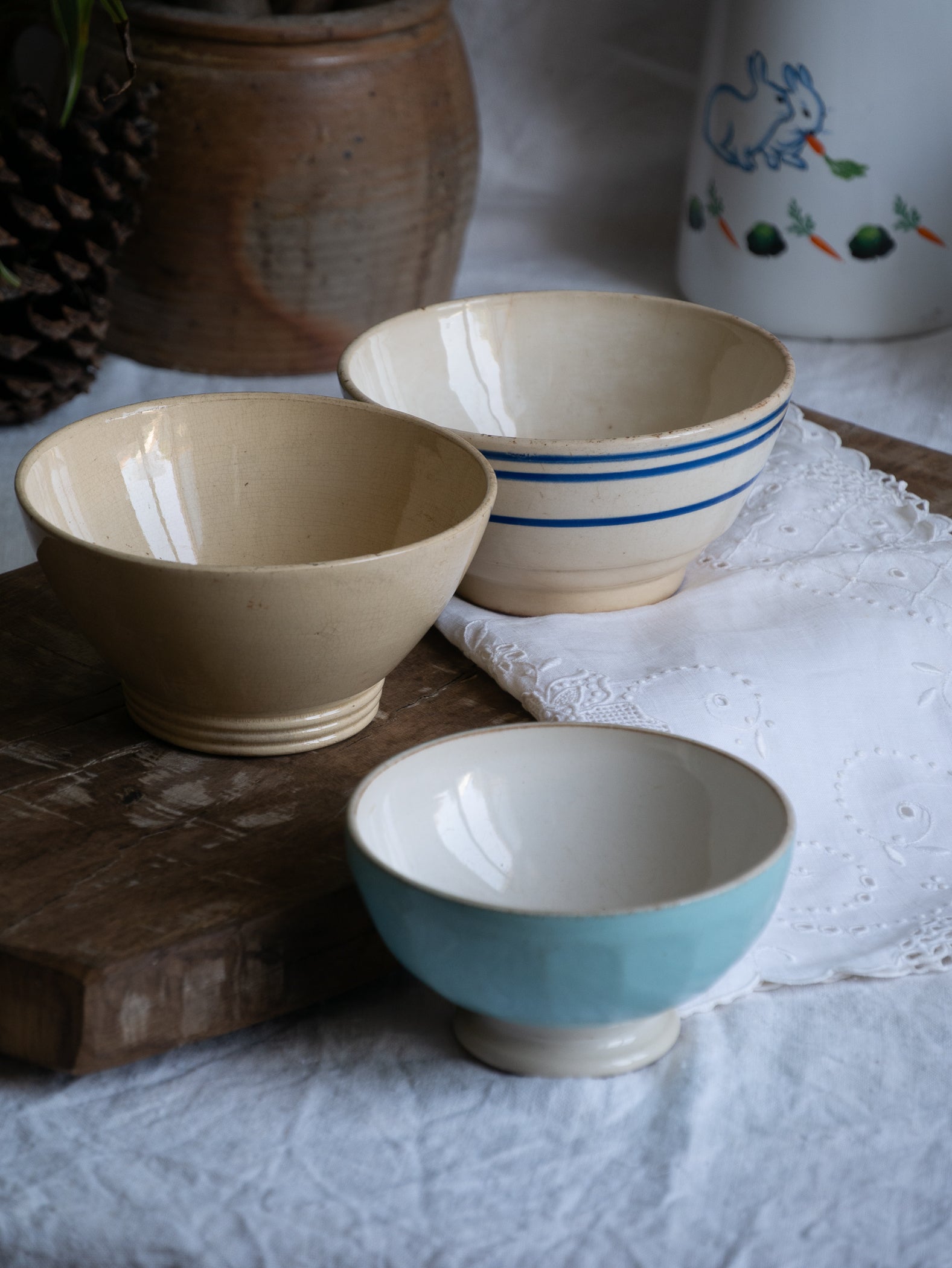 Three authentic French café-au-lait bowls in gently worn condition. Stack them for a slow weekend breakfast display, line them on an open shelf, or fill each with seasonal fruit for an easy pop of colour.
