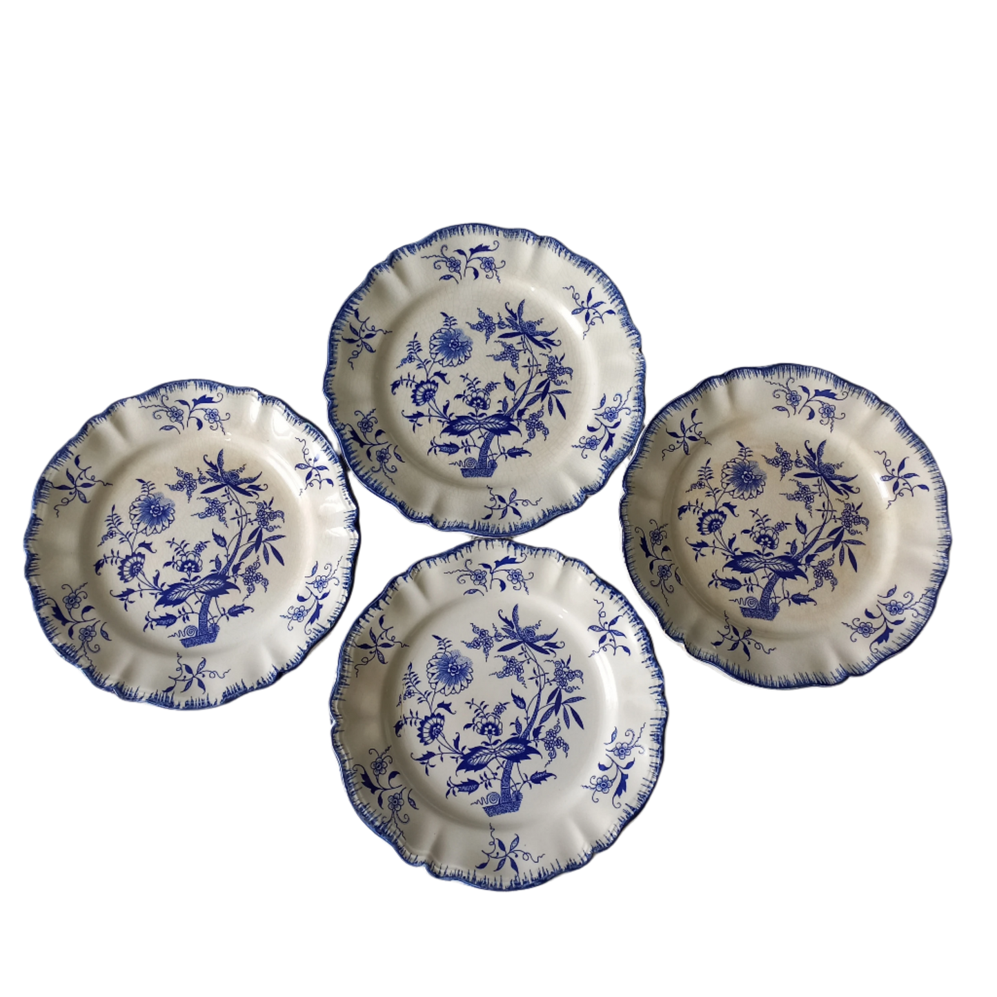 Antique ironstone white plates with blue floral patterns from France