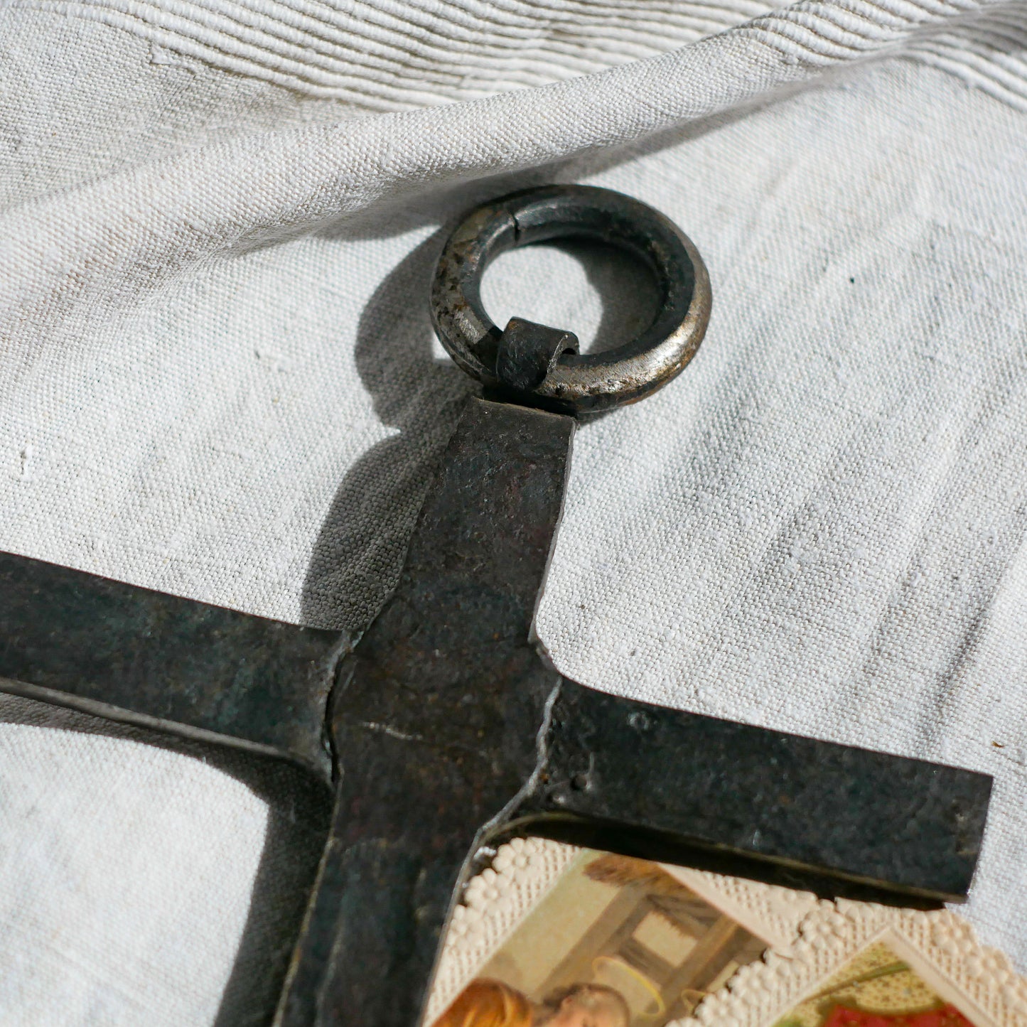 An interesting French antique artisan made Crucifix made from iron and painted black. On one side the metal has worn away in places giving this piece a pleasing patina of age. There's a hanging loop so it's ready to hang in your home.
We guesstimate this piece to be over 100 years old.
