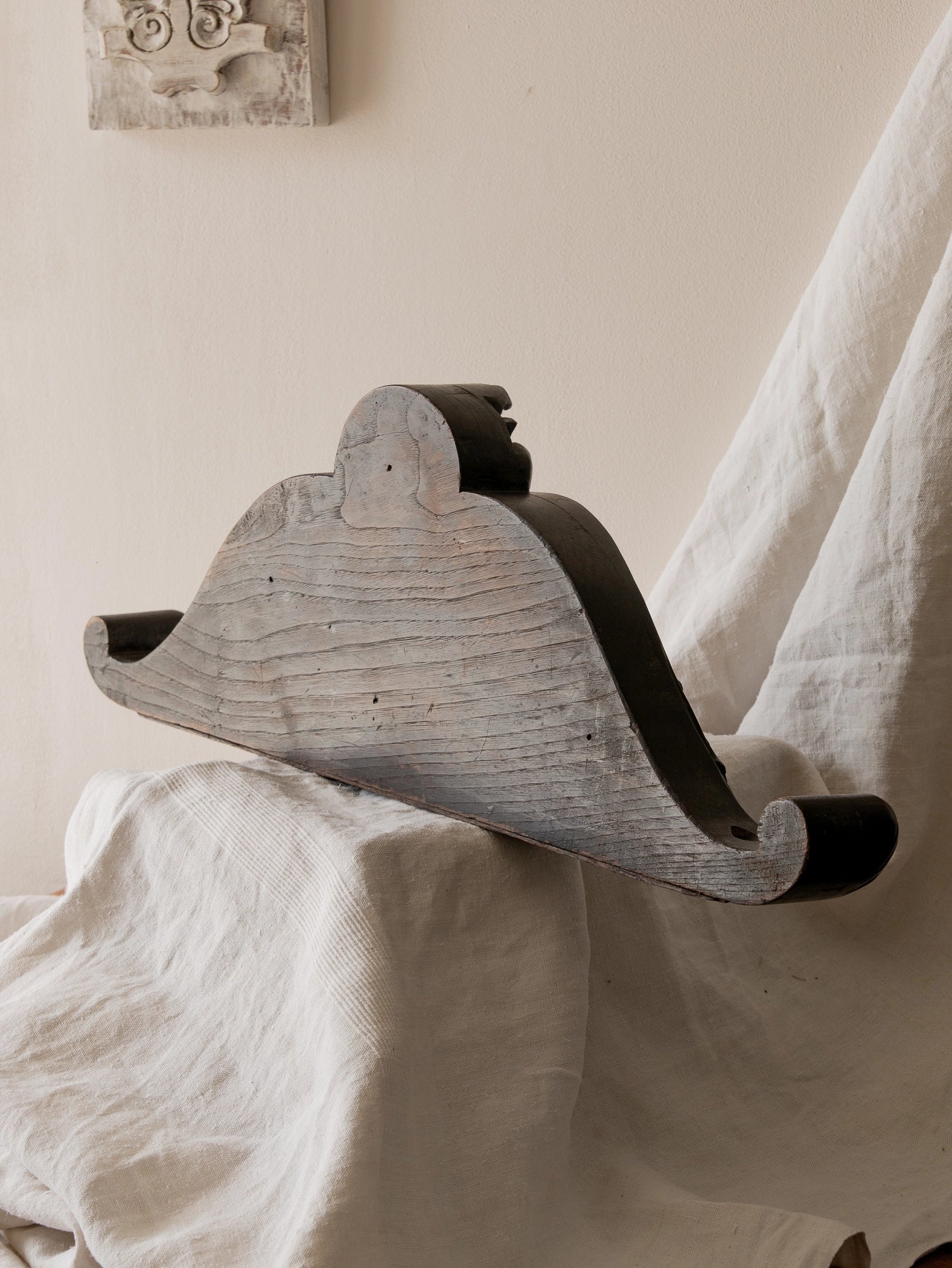 A stunning French antique carved dark wooden furniture pediment highly decorative and expertly crafted by a carpenter - this is a very heavy, quality piece and will look fabulous in any interior.