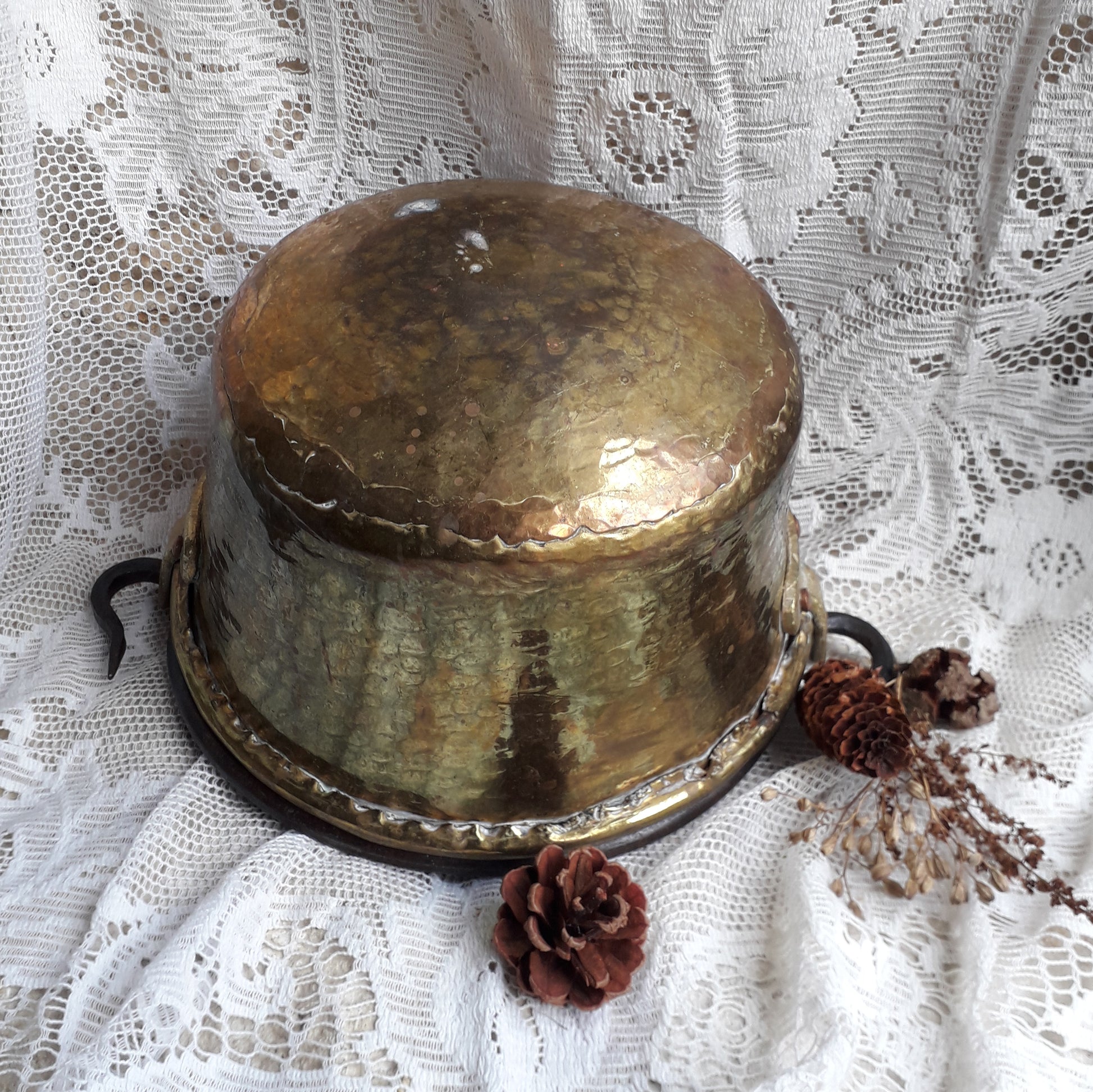 A wonderful little French vintage/antique brass hanging cauldron with an iron handle, a quality piece with substantial weight for its size. This delightful piece was hand-made, the joins beneath clearly visible,which makes it all the more charming. It will make a super piece of home decor or a hanging planter.