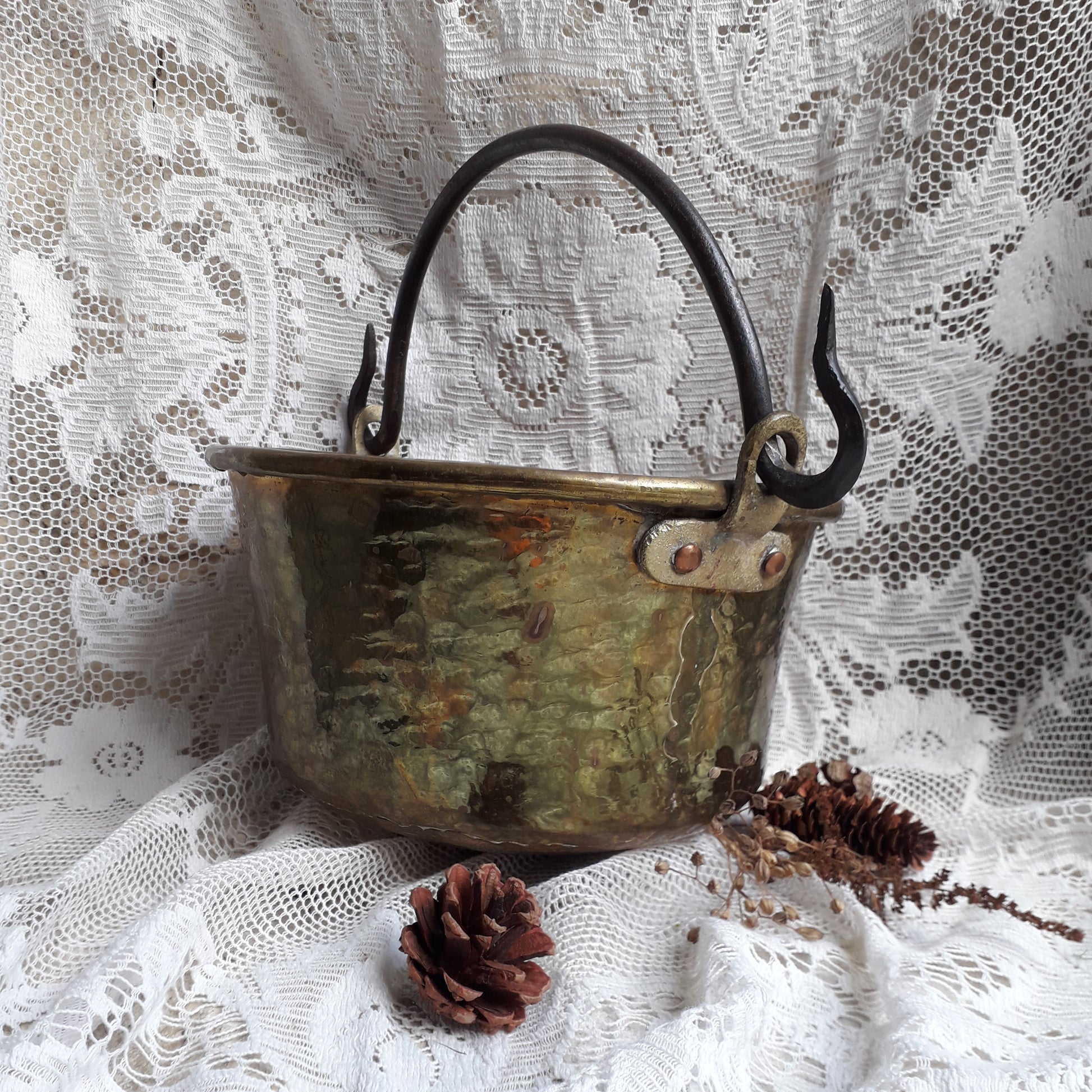 A wonderful little French vintage/antique brass hanging cauldron with an iron handle, a quality piece with substantial weight for its size. This delightful piece was hand-made, the joins beneath clearly visible,which makes it all the more charming. It will make a super piece of home decor or a hanging planter.