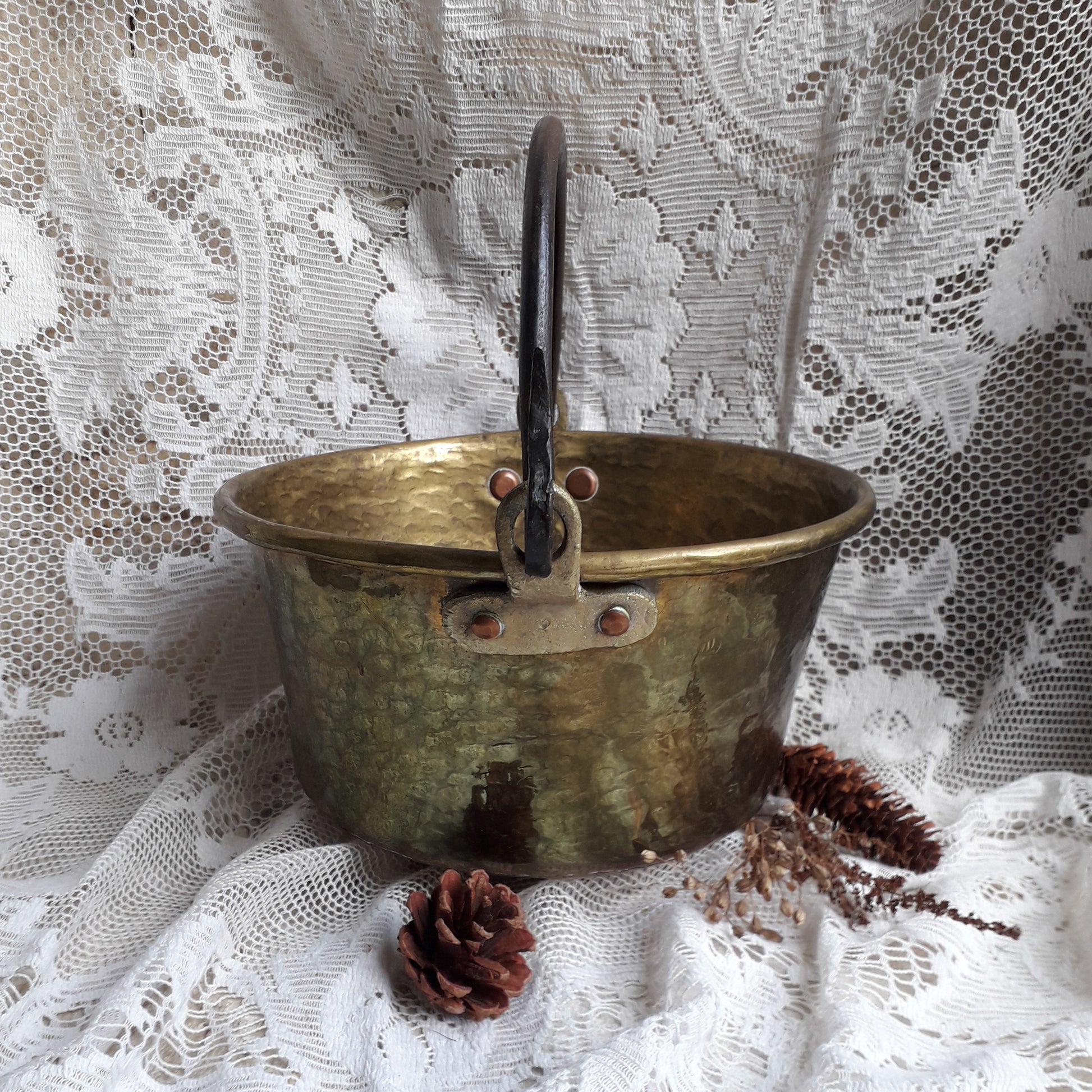 A wonderful little French vintage/antique brass hanging cauldron with an iron handle, a quality piece with substantial weight for its size. This delightful piece was hand-made, the joins beneath clearly visible,which makes it all the more charming. It will make a super piece of home decor or a hanging planter.