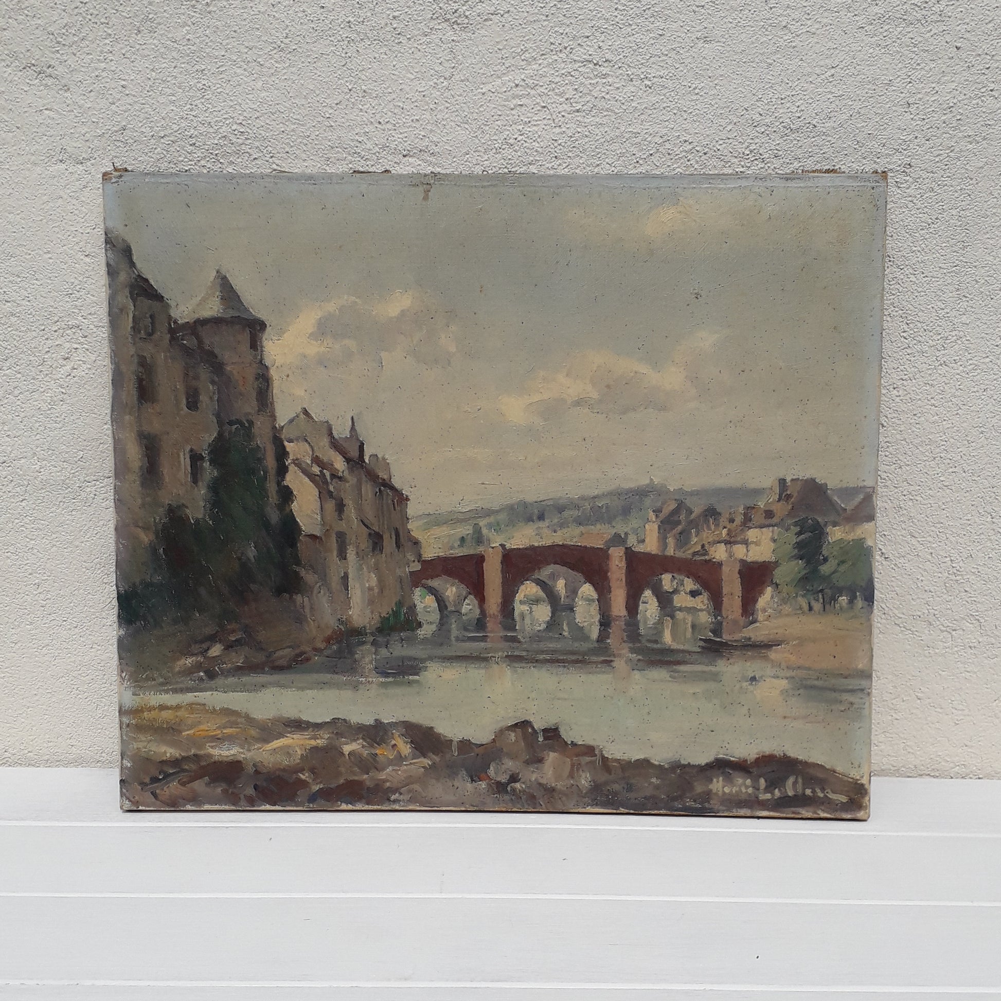 An exciting find and truly fabulous French vintage/antique oil painting depicting the old bridges of Espalion, Aveyron in France. The painting is signed Henri Le Clerc. Stretched canvas on wooden frame; to the rear on the wooden stretcher in very faded pencil is the location - my google search bought up a current view of this scene and little has changed. There is no date, although I guesstimate this painting to have been created in the early to mid 20th century.