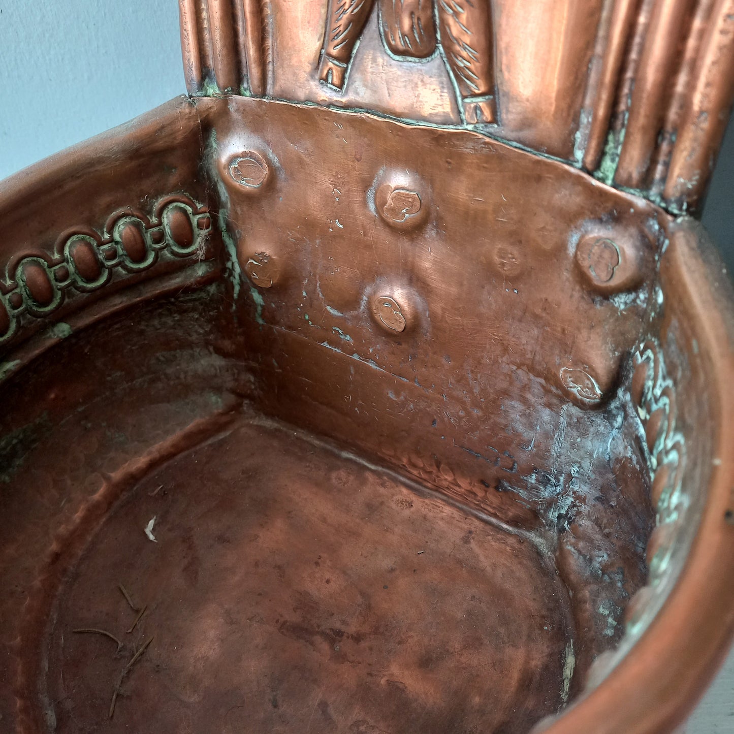 A very handsome copper vintage/antique wall-mounted planter with a hunting scene that I purchased in south west France.
This wonderful rustic piece may at some time have had another purpose, although being a planter seems to suit it just perfectly. There is a hanging hook to the rear, although it can also be displayed sitting on a flat surface as it's depicted in my photos - it's very interesting that we can also see the crude yet charming way this heavy copper planter was constructed by the artisan.