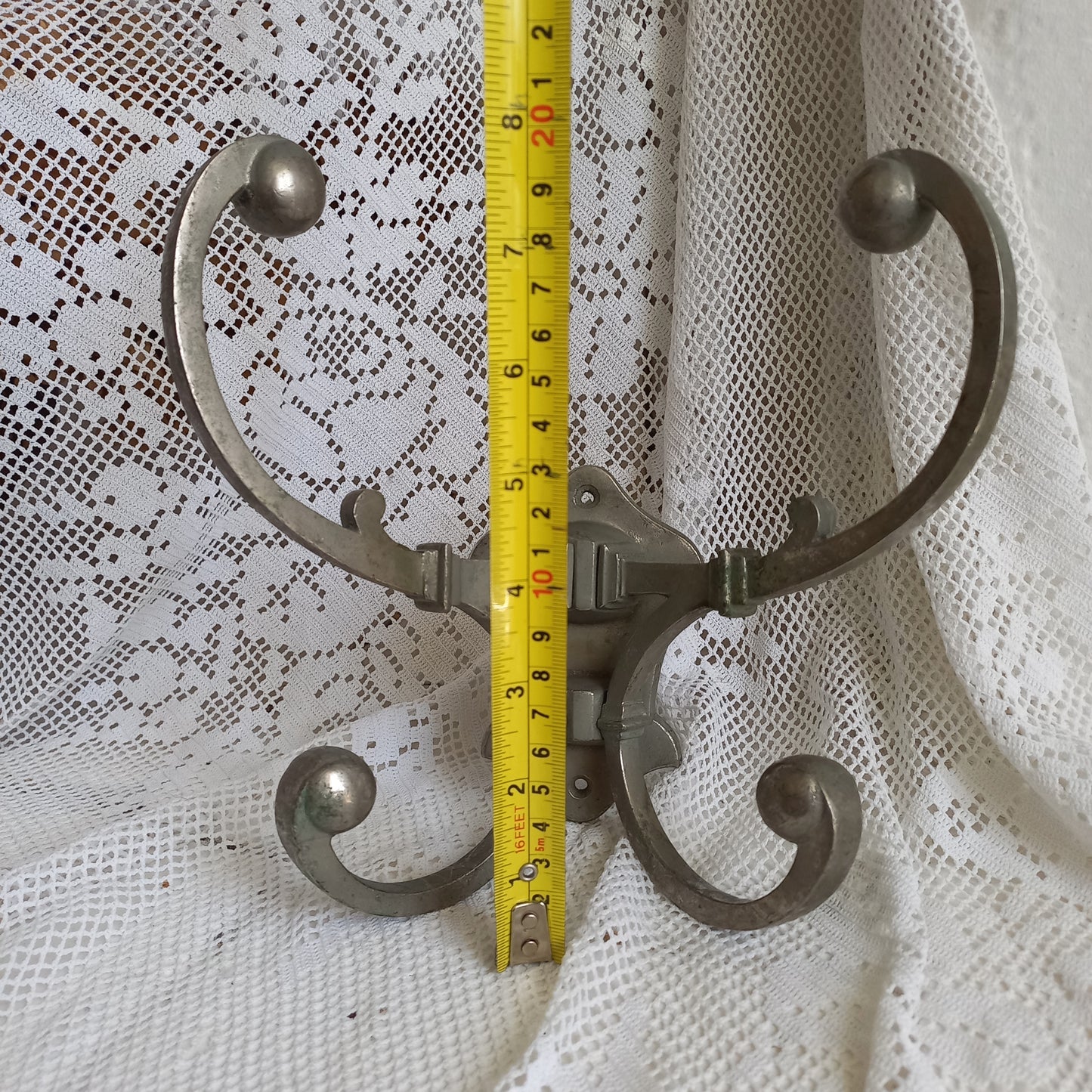 Antique metal coat and hat hooks wall mounted