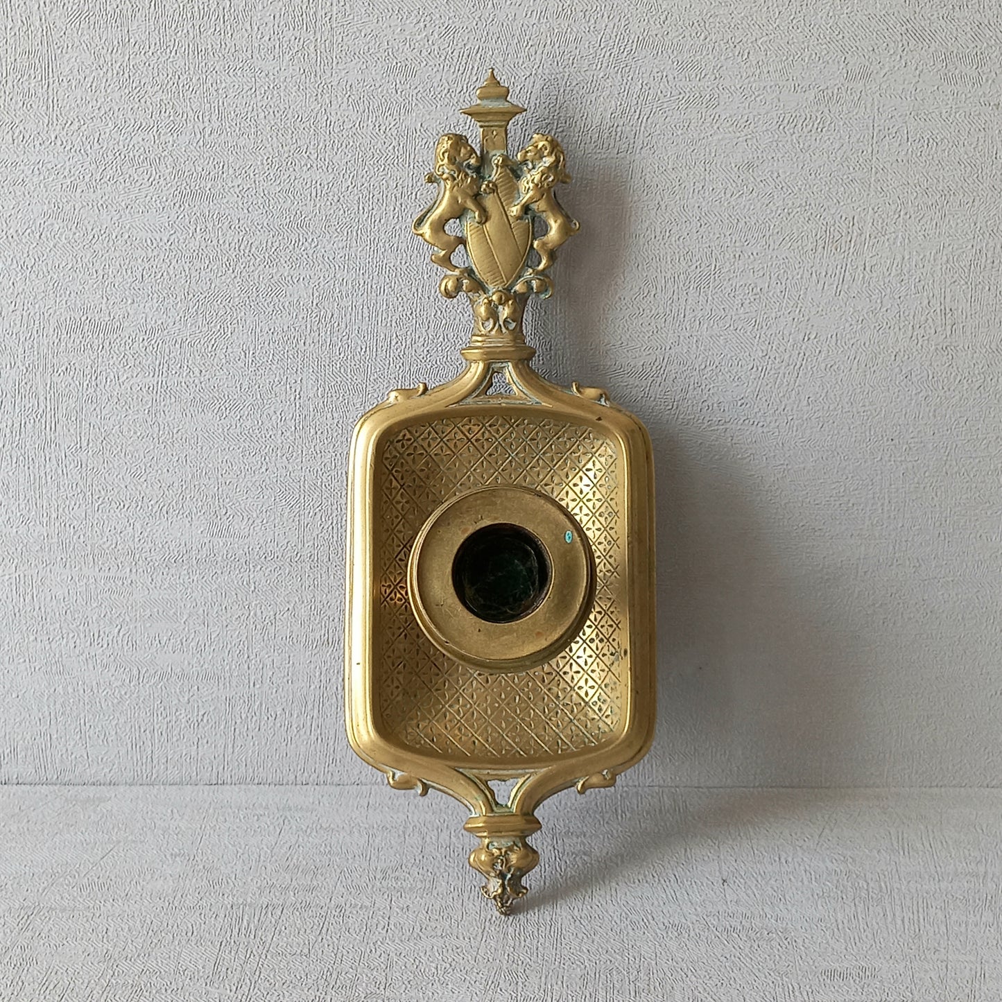 A French antique bronze/brass candle holder or chamber stick, a quality piece that is highly detailed with engraved patterns and a coat of arms with two lovely lions on the handle! This is a heavy piece for its small size and will make super home decor in any interior.