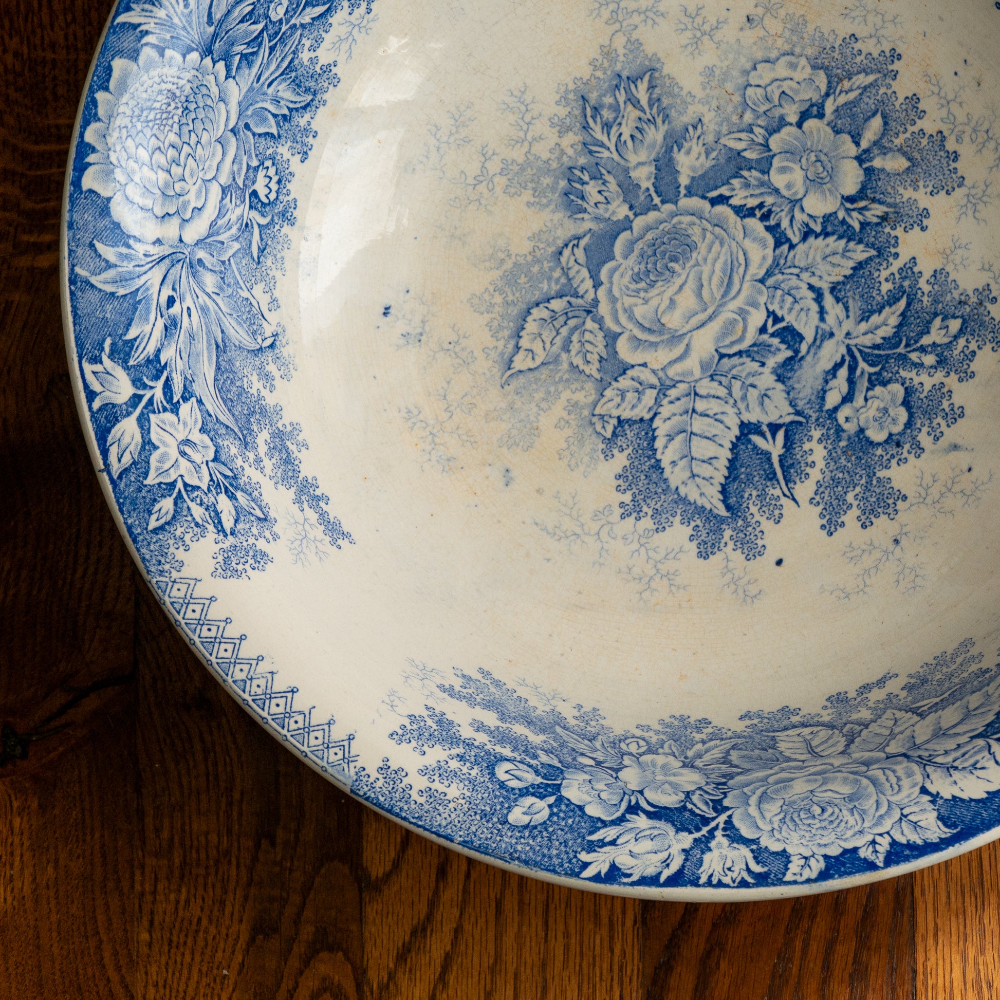A large and beautiful antique white ironstone bowl or wash basin with blue floral pattern by premier French manufacturer, Sarreguemines.
This piece is circa. 1875 - 1900 so well over 100 years old! 
A stunning piece of original antique ironstone from France that will make excellent home decor.