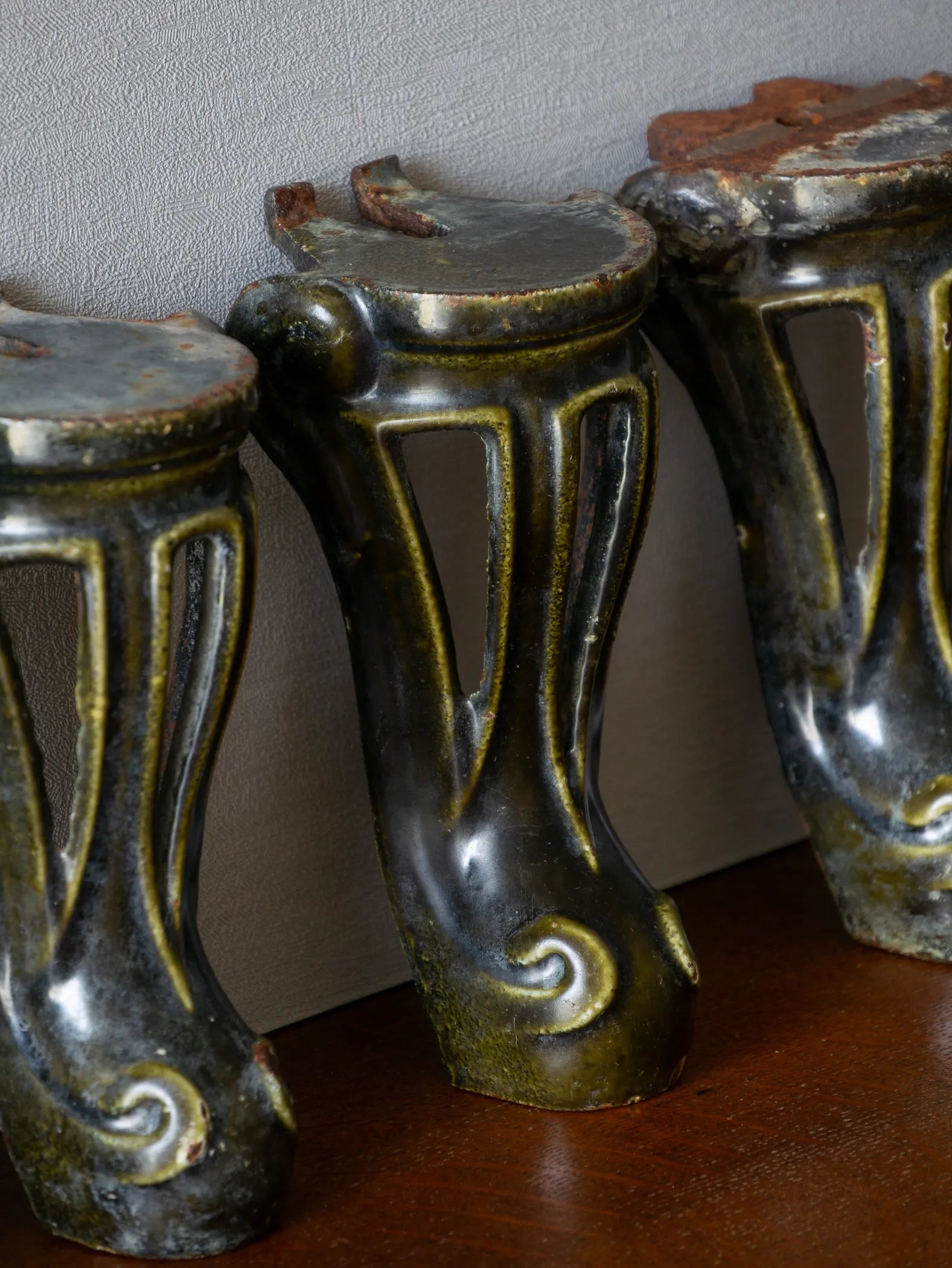 A set of 4 French vintage/antique cast iron bath feet / furniture feet with green enamel finishes, beautifully detailed and decorative pieces perfect for finishing a furniture project.