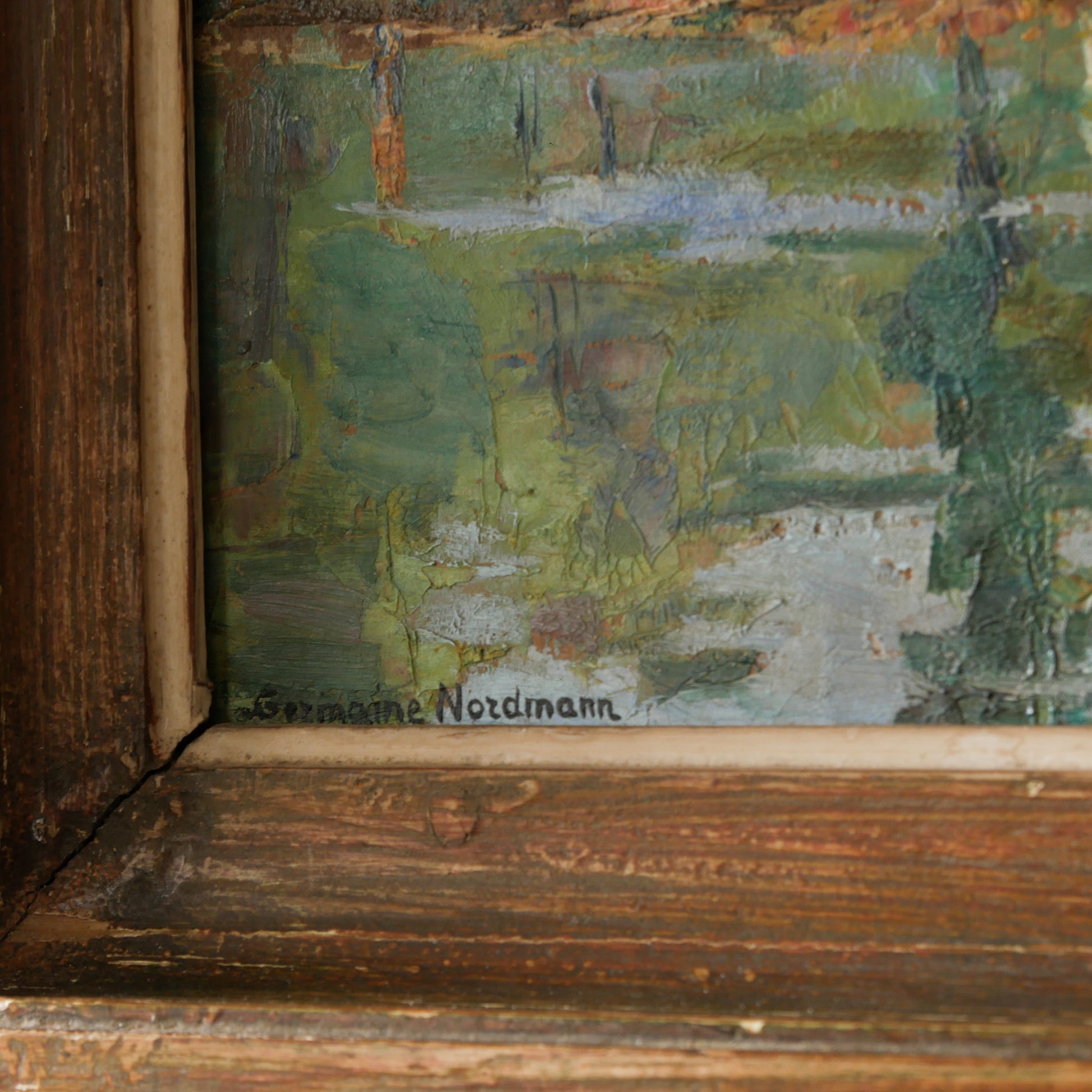 An original vintage landscape oil painting depicting a charming country home in among a wooded area with hills in the background. In the foreground a gentle river reflects the trees in the background.
The painting has been painted by an experienced artist with confident brush strokes - a really wonderful piece of original art.
The painting is presented in an old worn wooden frame which we love and think others will too - it really suits this piece.