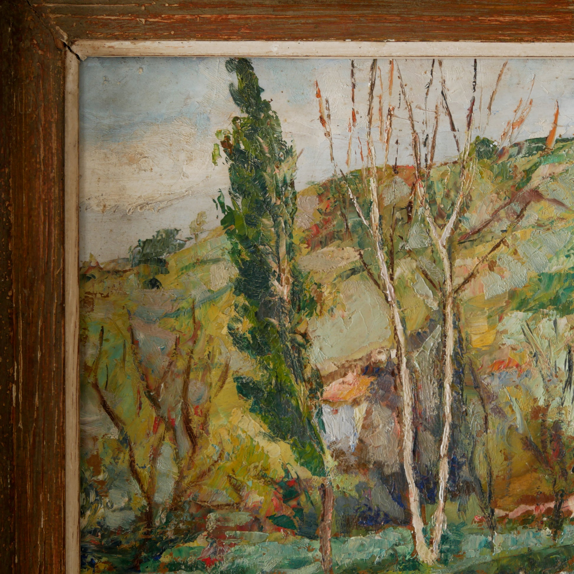 An original vintage landscape oil painting depicting a charming country home in among a wooded area with hills in the background. In the foreground a gentle river reflects the trees in the background.
The painting has been painted by an experienced artist with confident brush strokes - a really wonderful piece of original art.
The painting is presented in an old worn wooden frame which we love and think others will too - it really suits this piece.