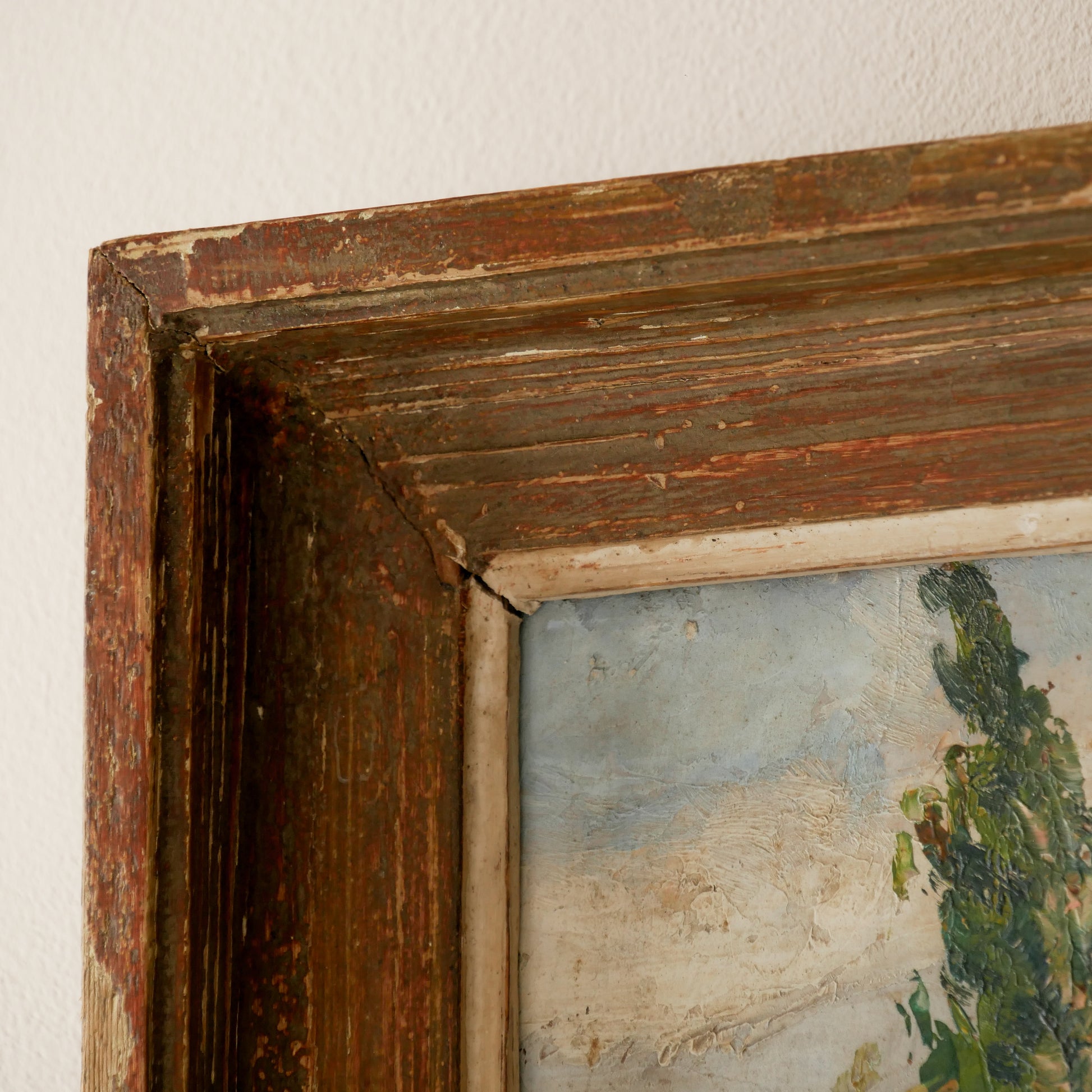 An original vintage landscape oil painting depicting a charming country home in among a wooded area with hills in the background. In the foreground a gentle river reflects the trees in the background.
The painting has been painted by an experienced artist with confident brush strokes - a really wonderful piece of original art.
The painting is presented in an old worn wooden frame which we love and think others will too - it really suits this piece.