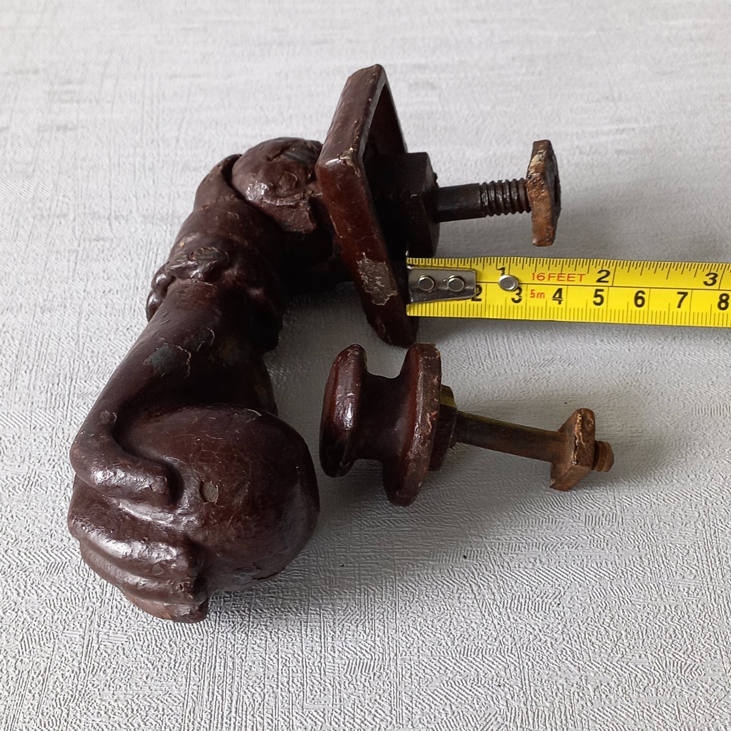 A French decorative antique cast-iron female hand door knocker, an original piece of door decor which is a quality and solid piece with shabby chic finish.