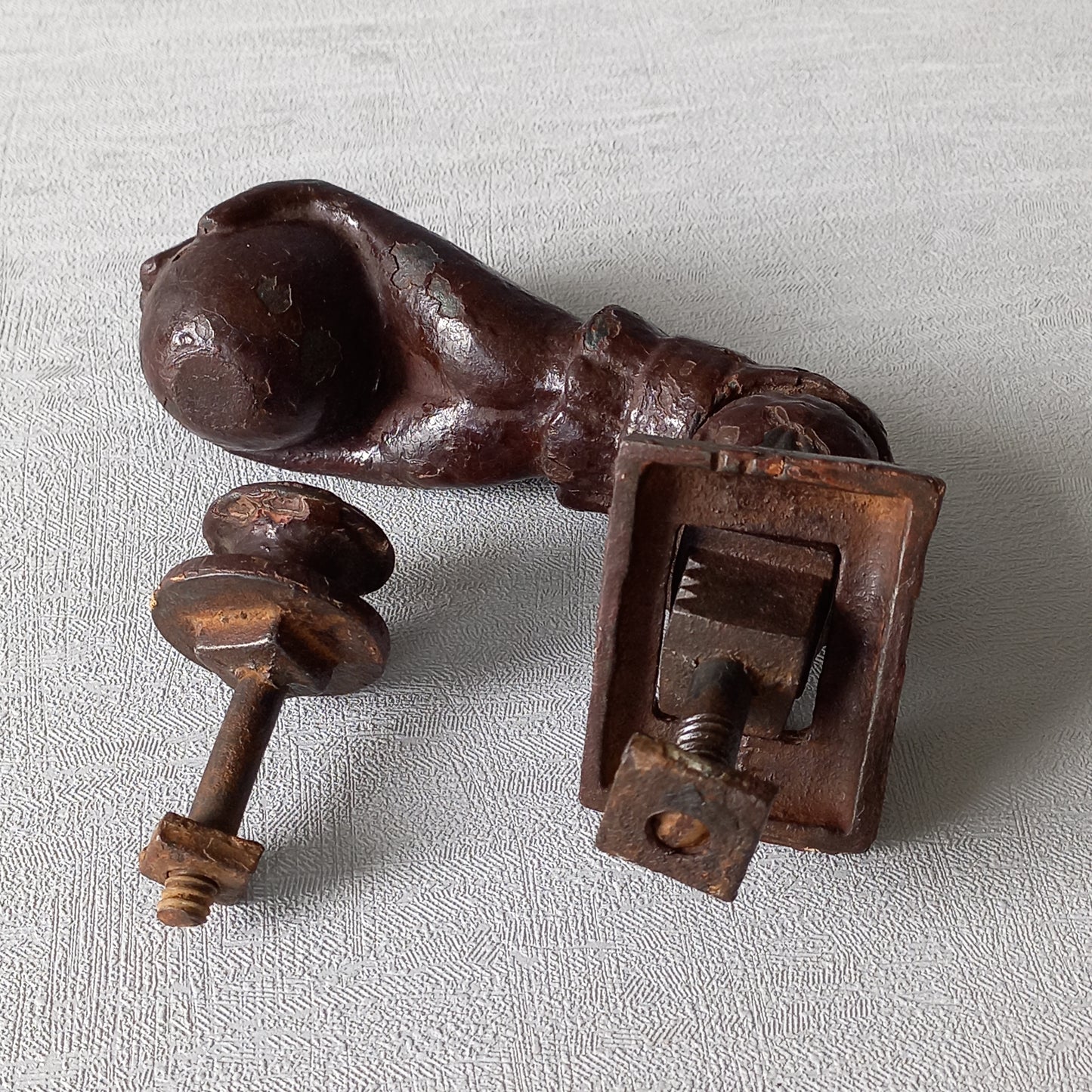 A French decorative antique cast-iron female hand door knocker, an original piece of door decor which is a quality and solid piece with shabby chic finish.