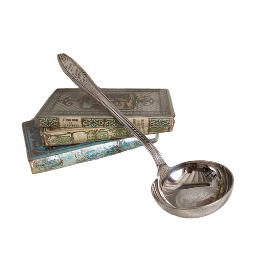 An elegant French vintage/antique silver-plated ladle with maker's stamps - a really nice decorative piece of flatware with a heavy, quality feel.