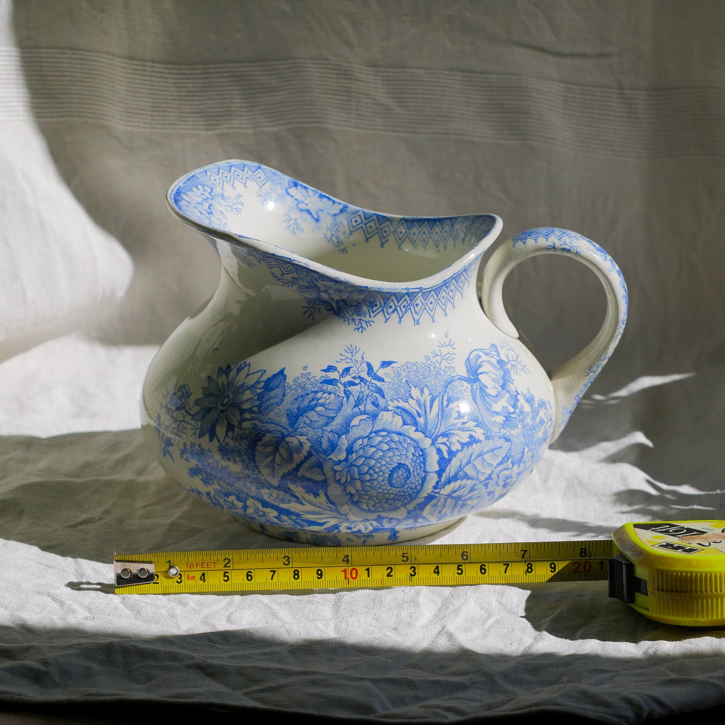 A beautiful French antique white ironstone jug with a pretty floral blue pattern. Once used as wash jugs these days these lovely old jugs make super pieces of home decor. The maker's mark is clearly identified underneath. A wonderful piece of antique ironstone!
Circa: late 1800s/early 1900s.