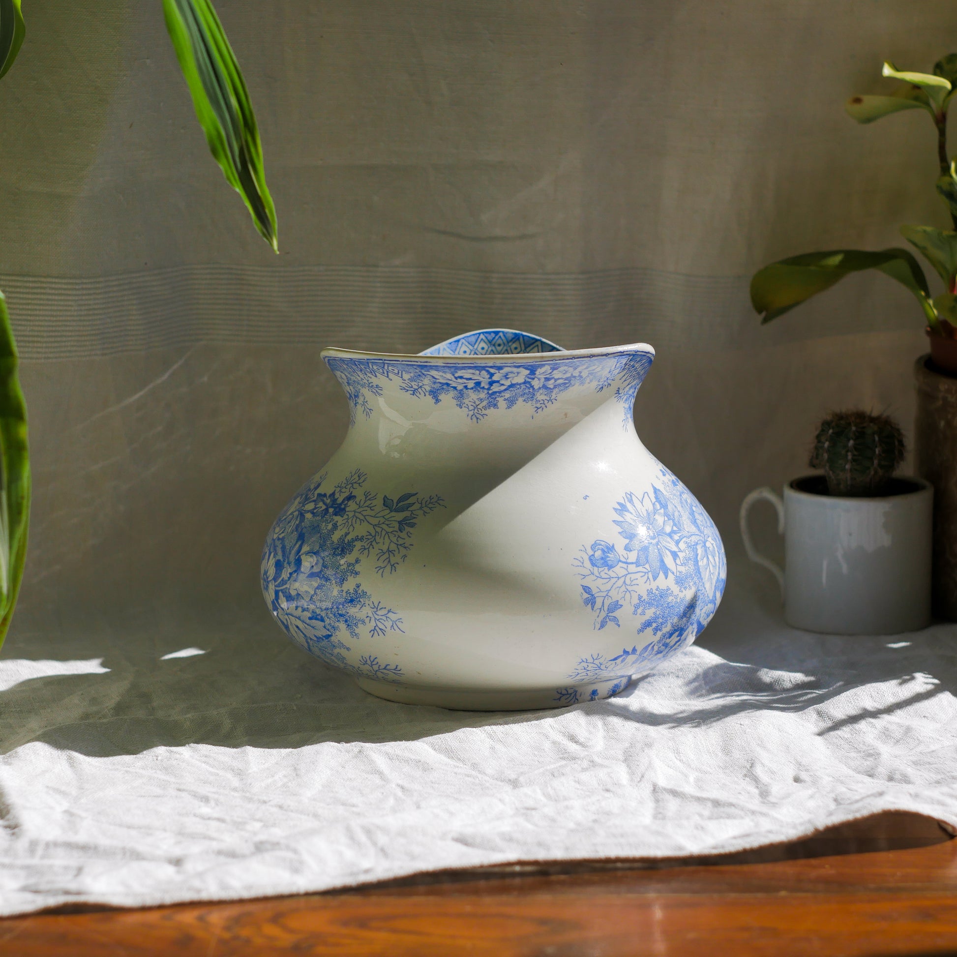 A beautiful French antique white ironstone jug with a pretty floral blue pattern. Once used as wash jugs these days these lovely old jugs make super pieces of home decor. The maker's mark is clearly identified underneath. A wonderful piece of antique ironstone!
Circa: late 1800s/early 1900s.