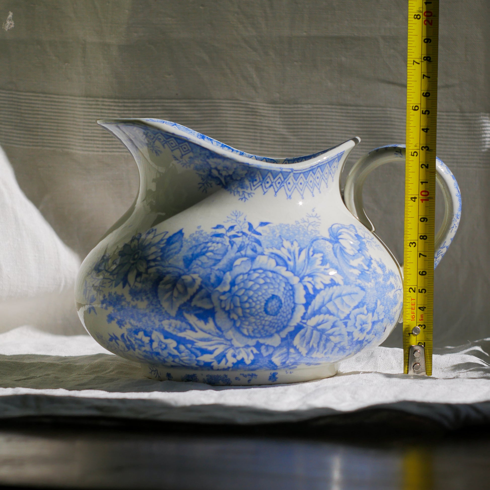 A beautiful French antique white ironstone jug with a pretty floral blue pattern. Once used as wash jugs these days these lovely old jugs make super pieces of home decor. The maker's mark is clearly identified underneath. A wonderful piece of antique ironstone!
Circa: late 1800s/early 1900s.