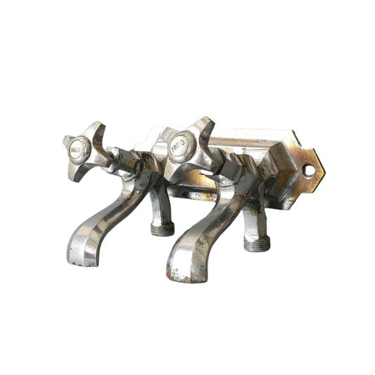 French vintage hot and cold faucet taps that are heavy, quality pieces being sold as a restoration piece or project.