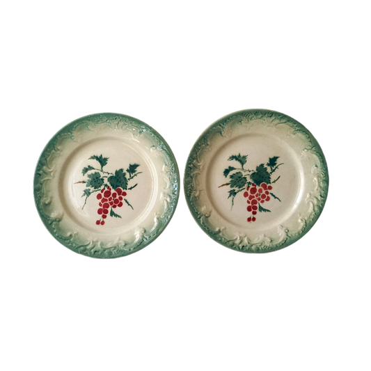 A pair of small French vintage/antique decorative plates with a transfer pattern called 'Fruits'. These plates are a lovely time-worn white/cream with green leaf and red berry transfer pattern; around the circumference is an attractive decoration in relief. The maker's mark is Faïencerie de Castres who closed their factory in 1936, so these pieces are early 20th century. In summary, wonderful old plates from France which will make super display pieces.
