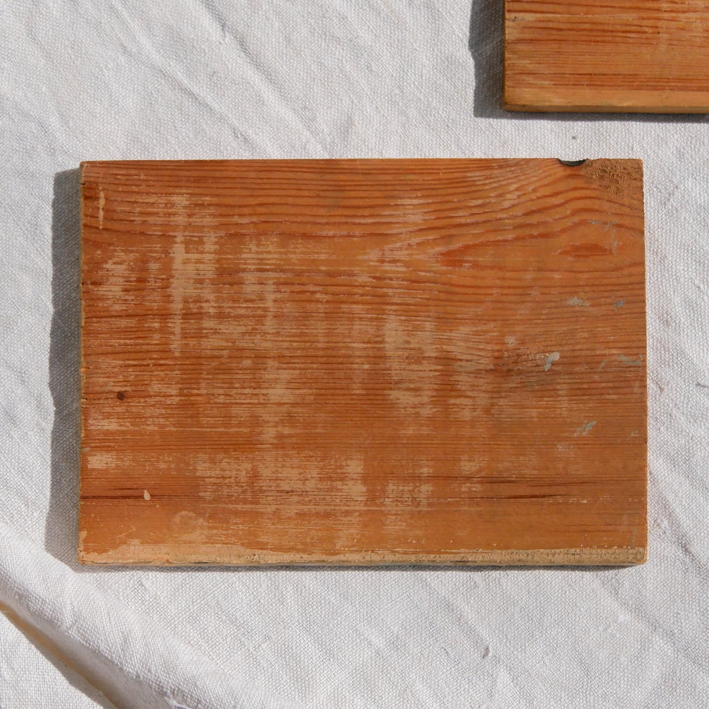 A beautiful pair of small coastal beach paintings on little wooden boards. Each original painting is wonderfully rendered with delightful and moody colours. The artist has signed one painting.
These original pieces of art look great displayed against a wall or on a mantelpiece, etc, and would also look equally nice on miniature easels as seen in two of our photos, or framed and on the wall - many possibilities!