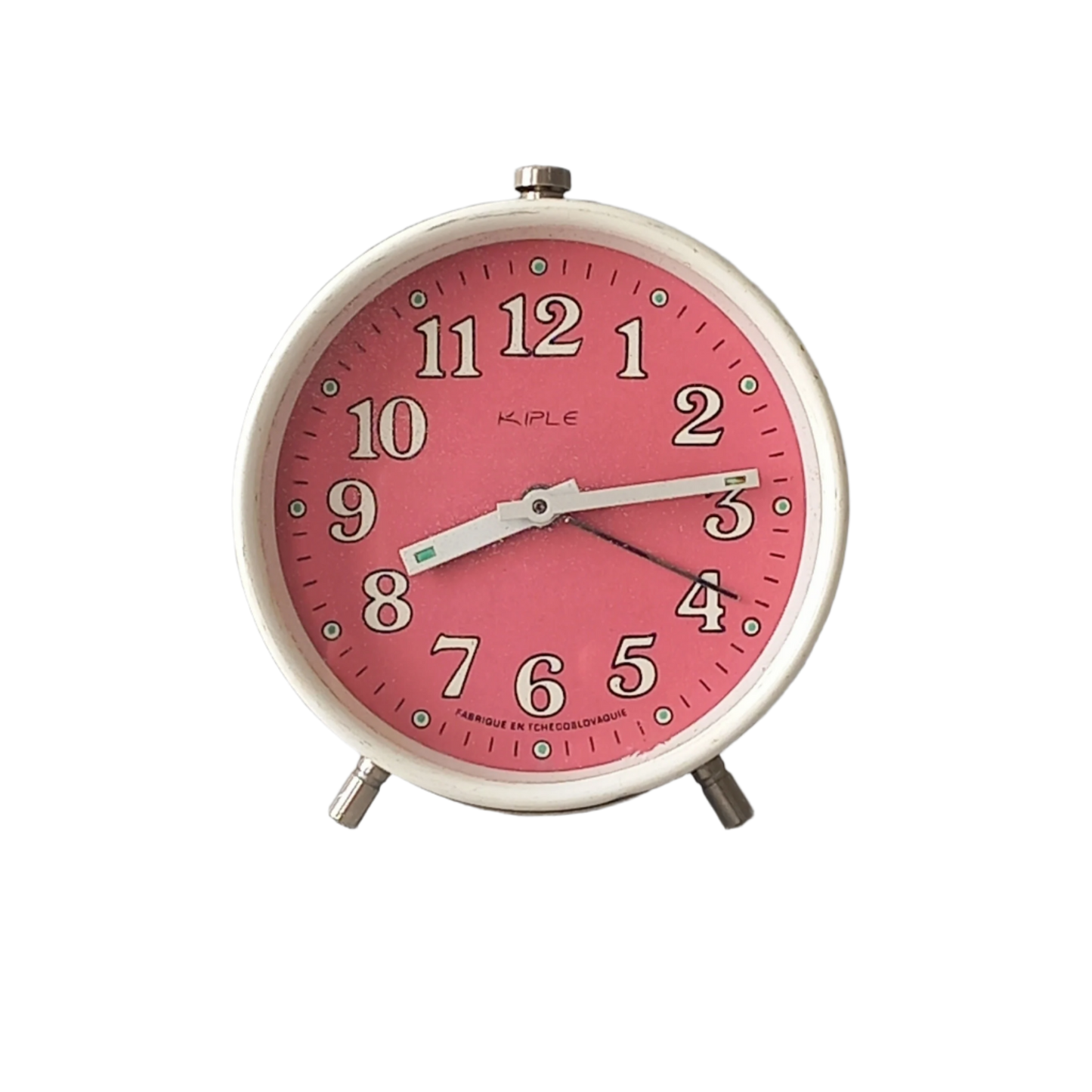 A vintage alarm clock in an eye-catching white and pink color scheme. This old clock is in working condition including the alarm and has a nice soothing ticking sound too. A great piece of European history from the former country of Czechoslovakia.
In summary, a nice vintage alarm clock!