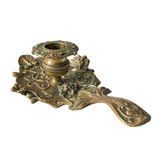 An original French art nouveau brass chamber stick, a small and decorative antique candle holder that will be a welcome addition to any interior.