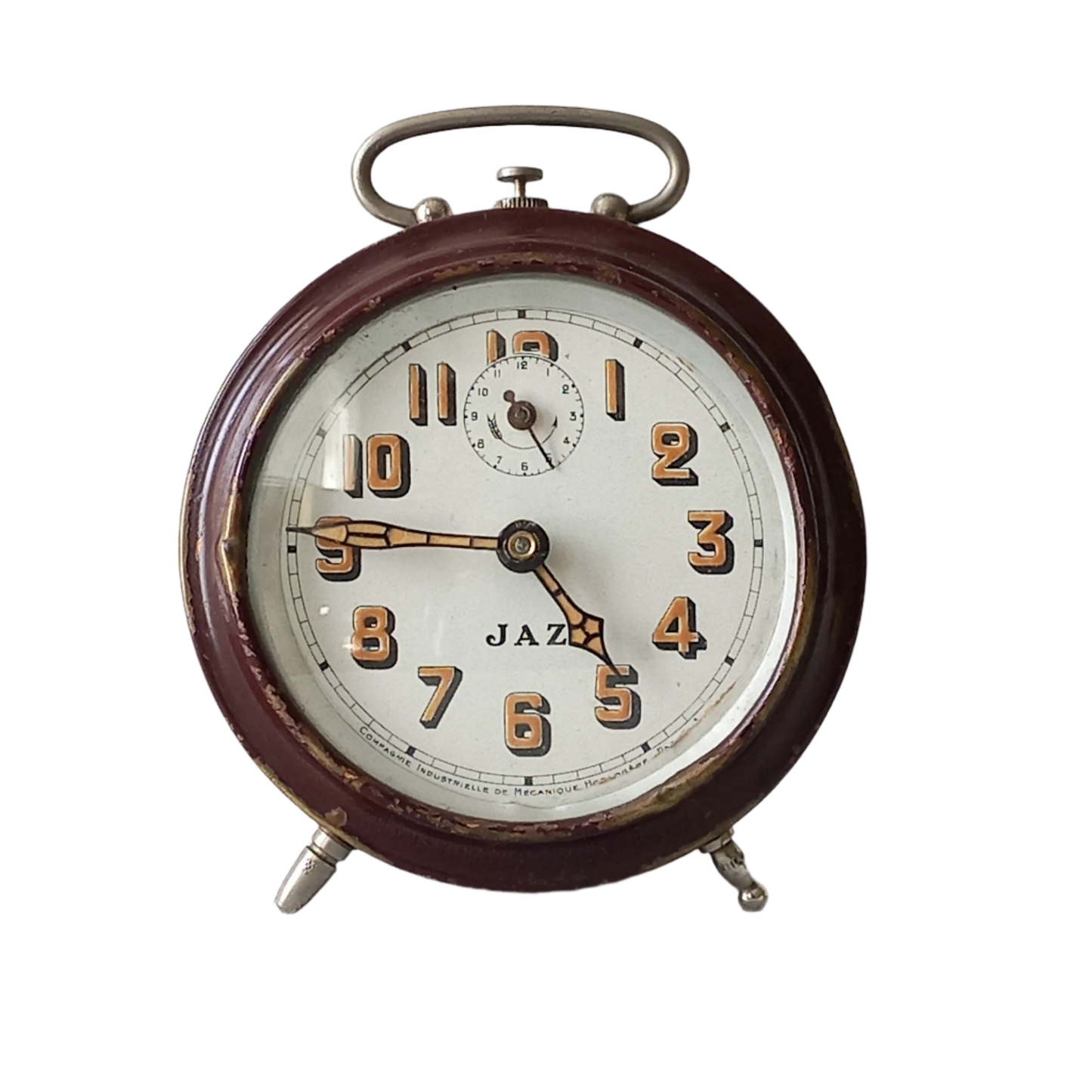 A handsome little vintage alarm clock by premier French manufacturer, Jaz.
This wonderful little clock is in semi-working condition including the alarm, although I should note that being an old time piece dating from the pre-1940 period he's temperamental and sometimes will just stop working, although all that's needed is a gentle shake from side to side and he will once more begin to tick - sometimes you might have to repeat this and have patience with him.