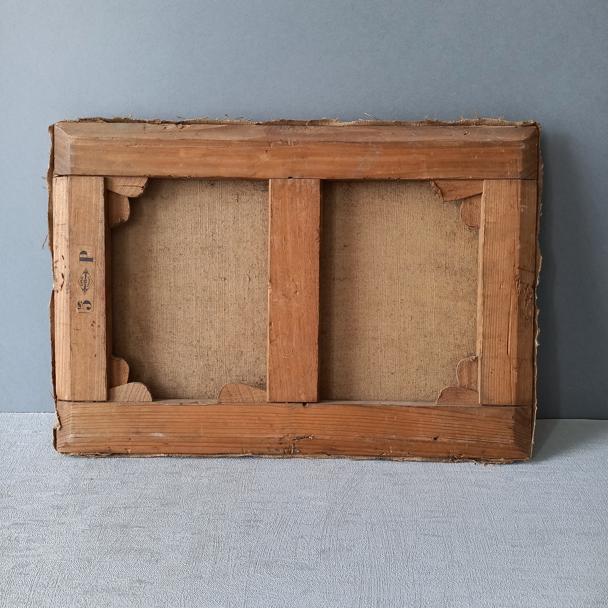 A stunning little French antique floral oil painting, really wonderfully painted with confident brush strokes. This piece is very old as you can see, especially when you view the rear of the canvas - there's a little label to the rear with a Paris mark - probably where the canvas originated.
In summary, beautiful and original antique art from France.