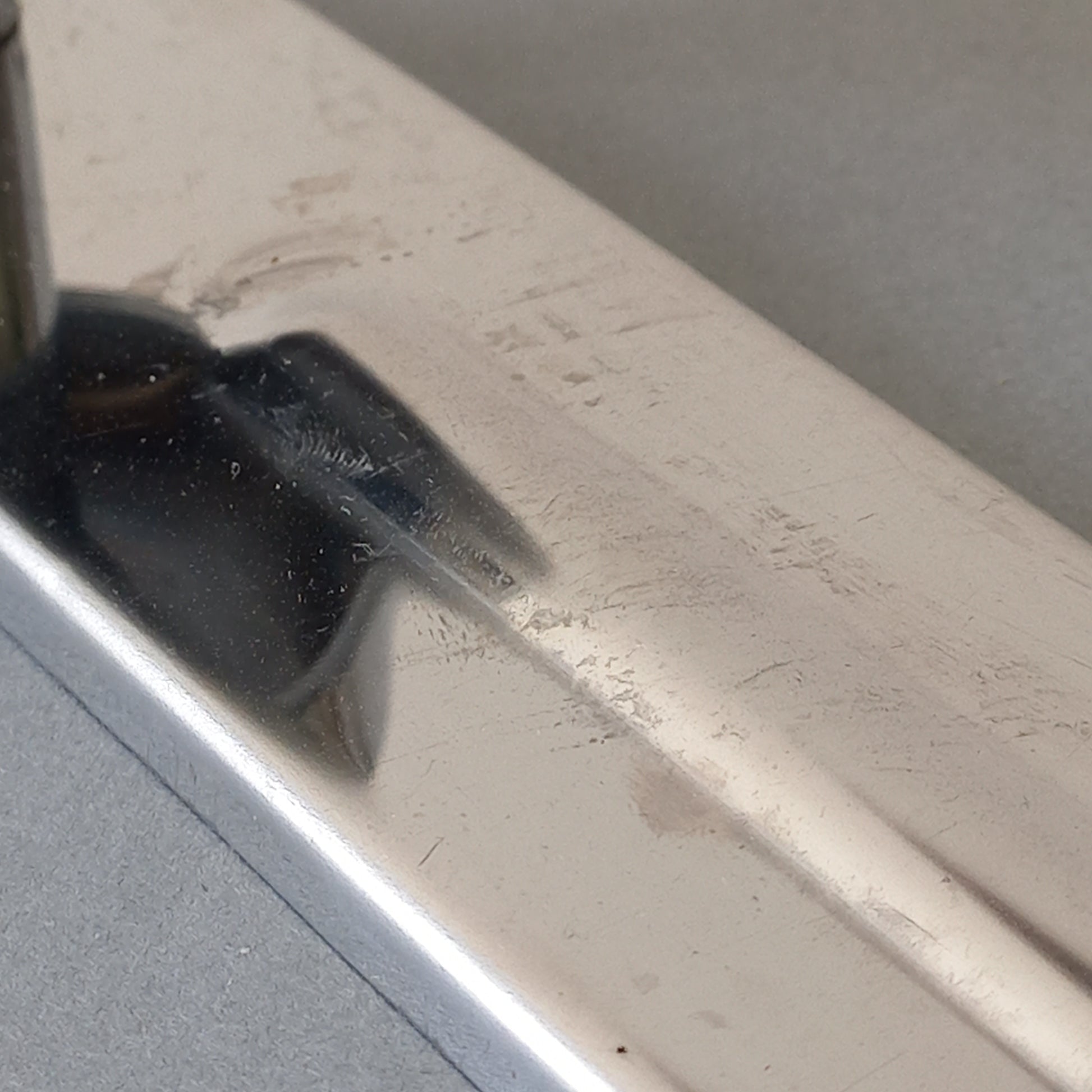 A stylish French vintage 4 peg metal coat rack with a polished finish, a great piece of practical wall decor for your home.