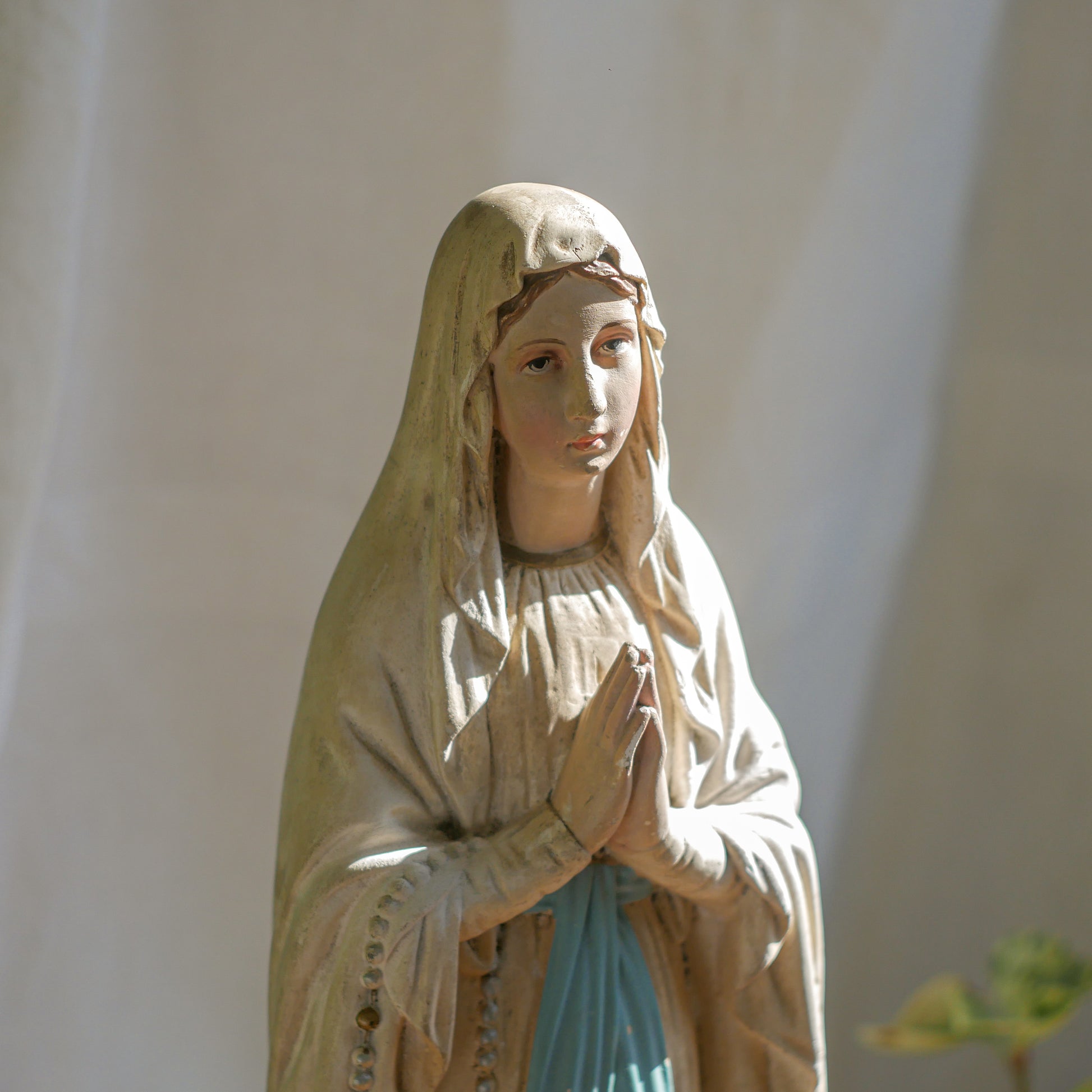 A large and stunning French vintage/antique religious Madonna figurine with wonderful subtle and time-faded coloring, a hard to find piece in this wonderful condition which has just the right amount of aging. This beautiful statue makes excellent religious decor in any home.