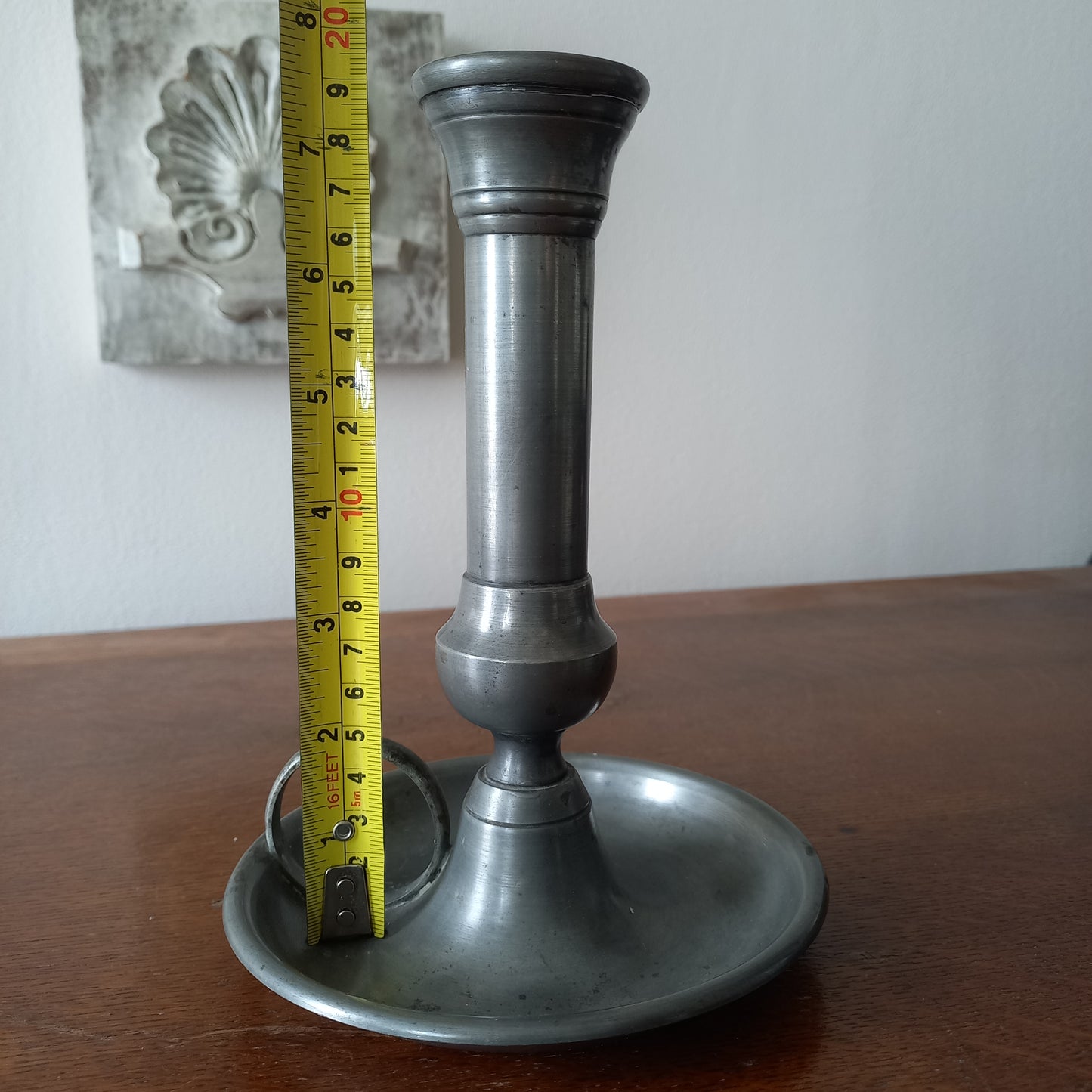 A handsome French vintage pewter candle holder / chamber stick that makes excellent home decor. This chamber stick is taller than similar ones we usually find. Underneath is marked with the manufacturer's stamp - a great looking piece!
