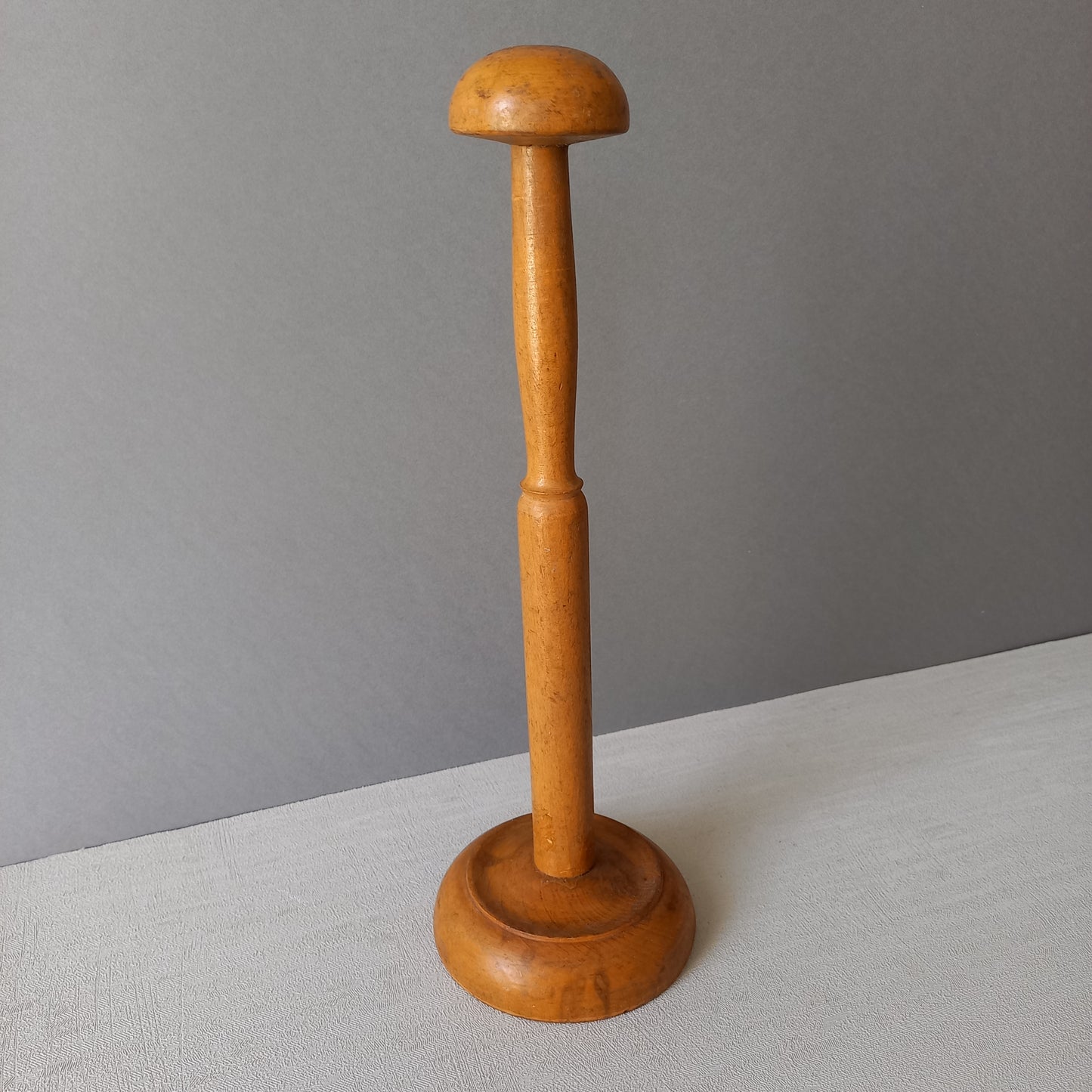 A sturdy French vintage wooden hat stand which will be great for displaying your hats, helmets, etc. In summary, a nice authentic French vintage piece from France.