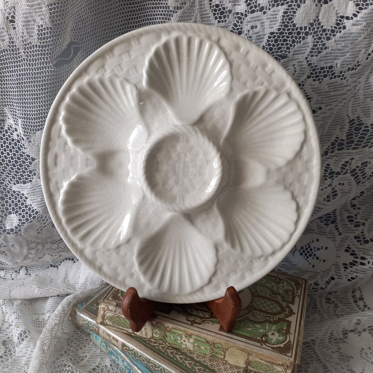 Decorative vintage oyster plate in creamy white colour, French seafood plate