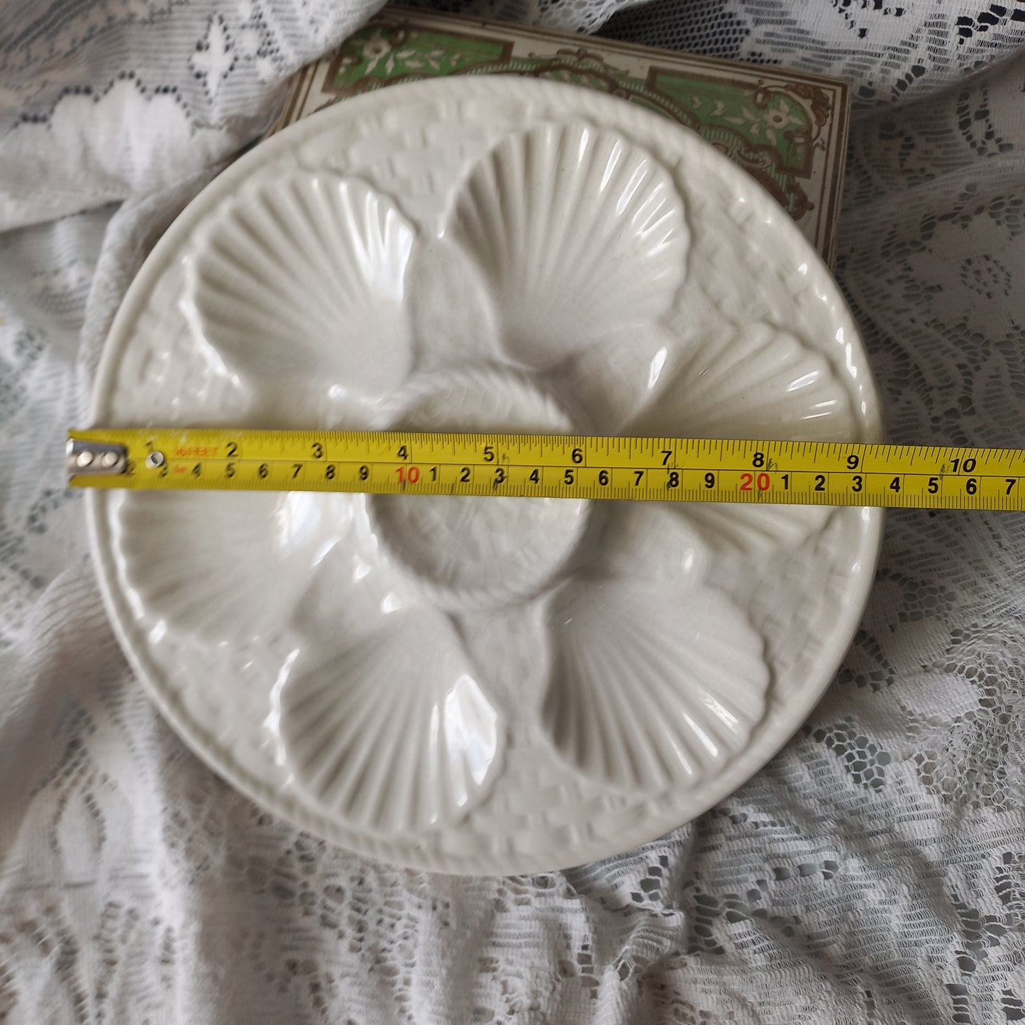 Decorative vintage oyster plate in creamy white colour, French seafood plate