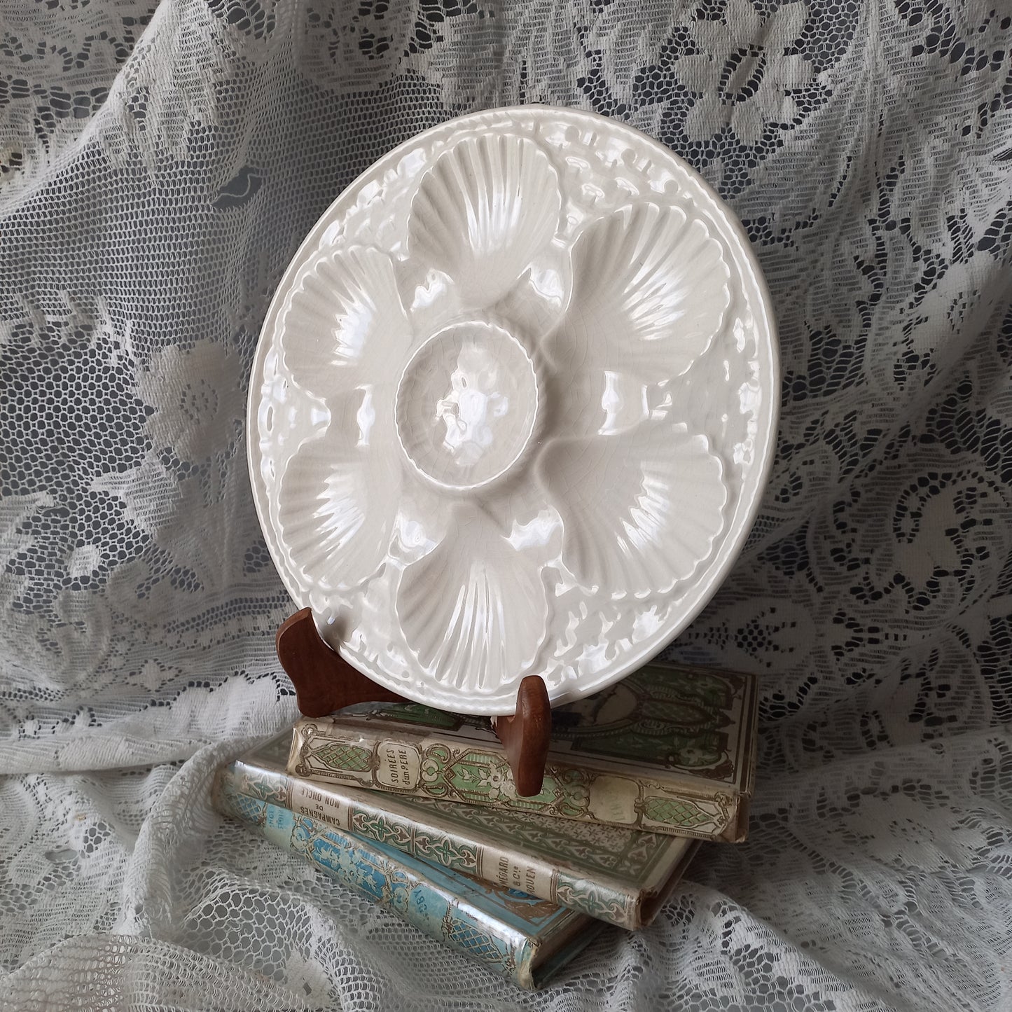 Decorative vintage oyster plate in creamy white colour, French seafood plate