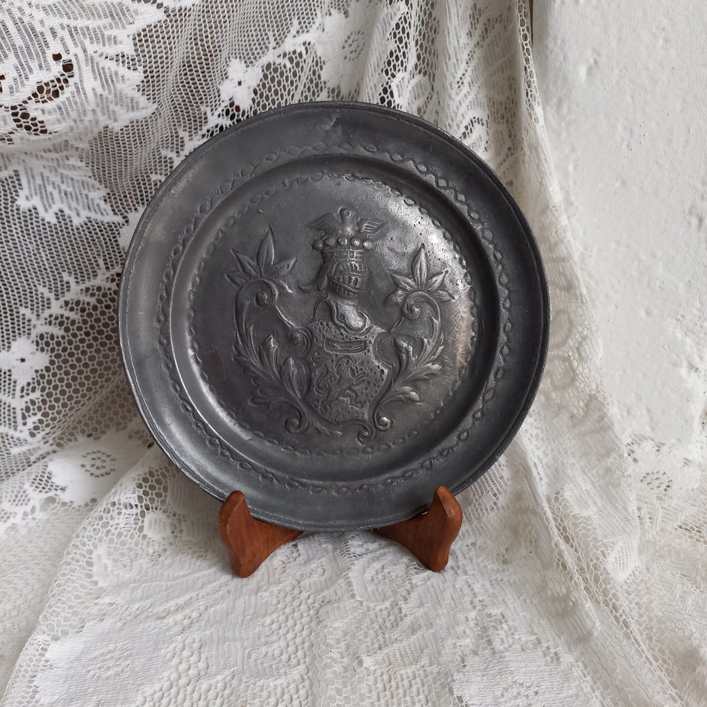 Decorative pewter plate with embossed coat of arms from France