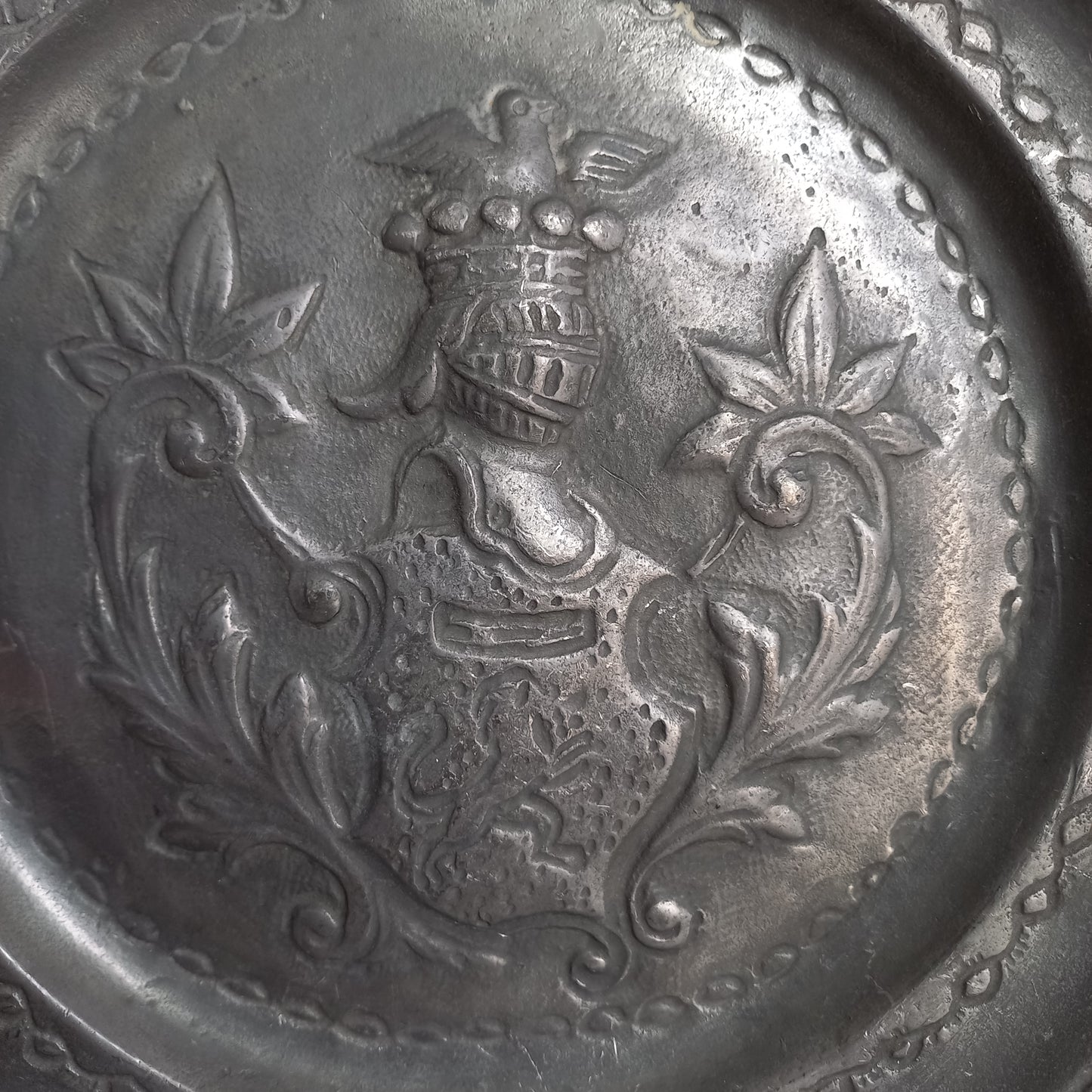 Decorative pewter plate with embossed coat of arms from France