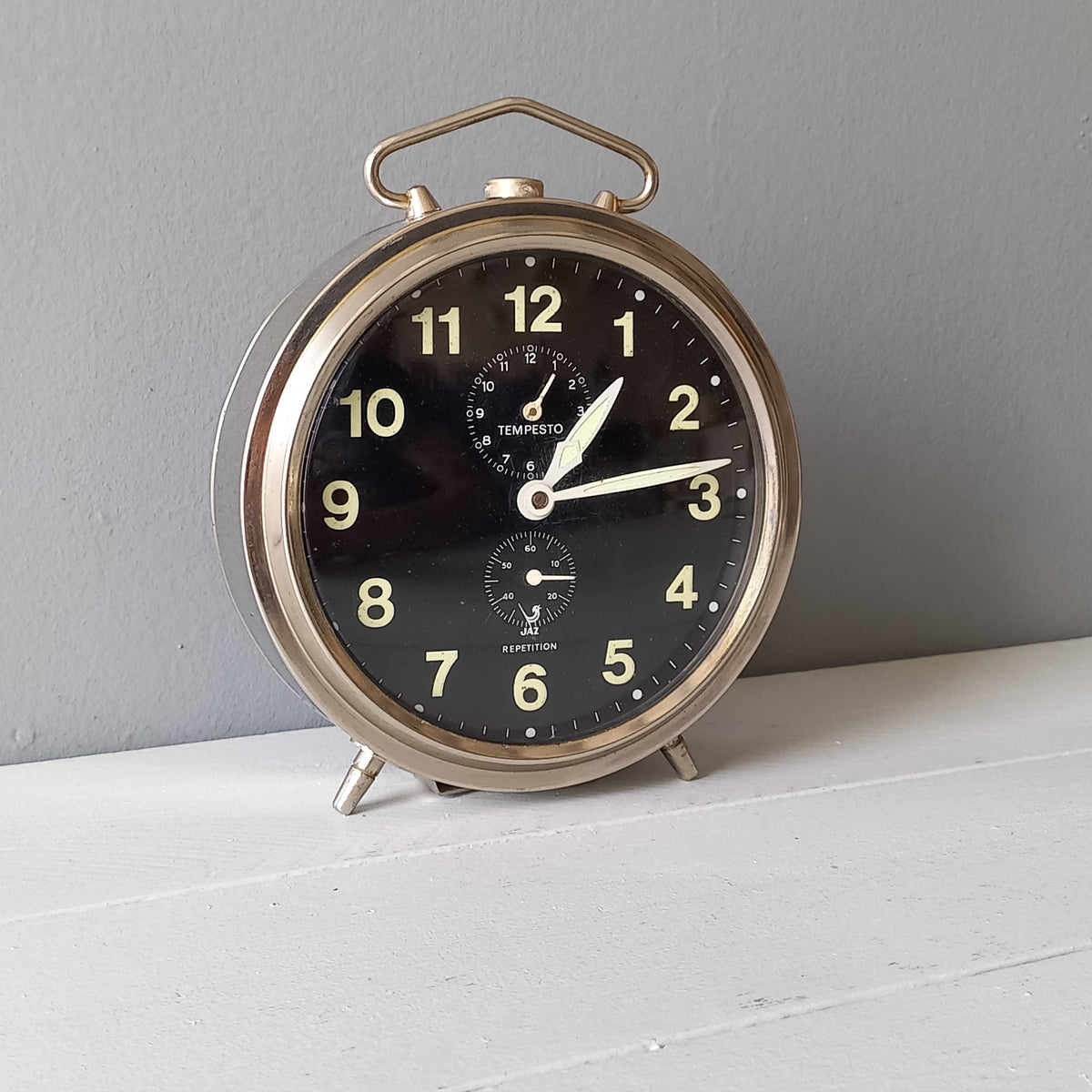 A large French vintage alarm clock by premier clock manufacturer Jaz. In good working condition including the alarm. This mechanical clock gives a pleasing ticking sound that varies in speed sometimes. Circa. 1970s.