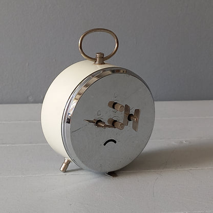 white vintage alarm clock, retro mechanical clock, bedside or nightstand ticking clock