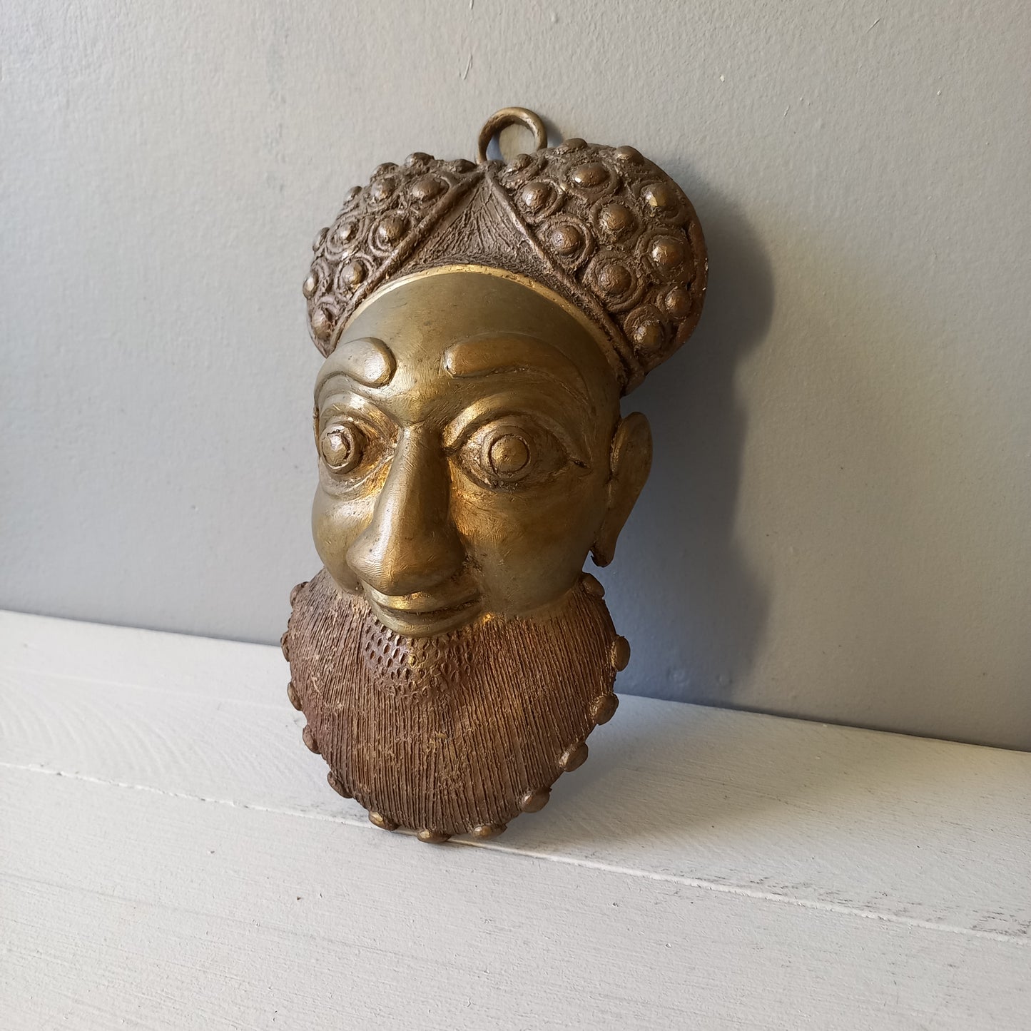 Decorative vintage metal tribal mask, Ethnic bearded man's face decorative wall art