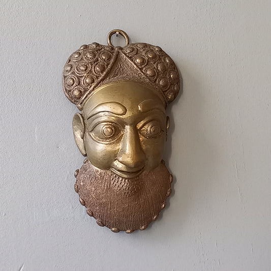 Decorative vintage metal tribal mask, Ethnic bearded man's face decorative wall art