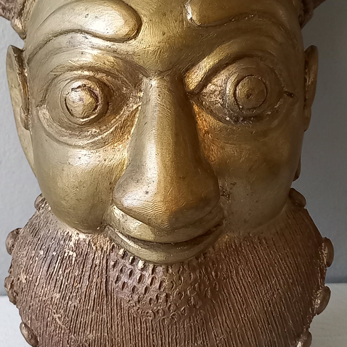 Decorative vintage metal tribal mask, Ethnic bearded man's face decorative wall art