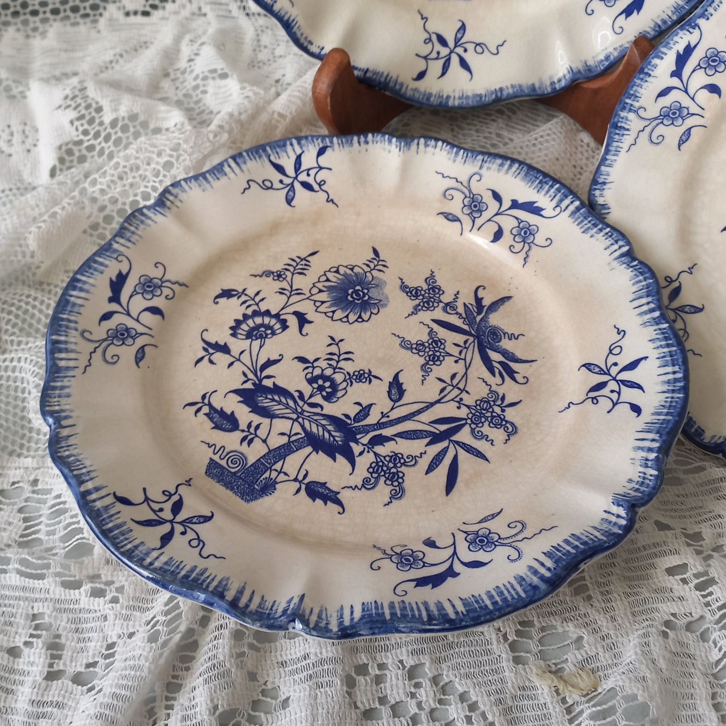 Small antique white ironstone plates with blue floral patterns from France