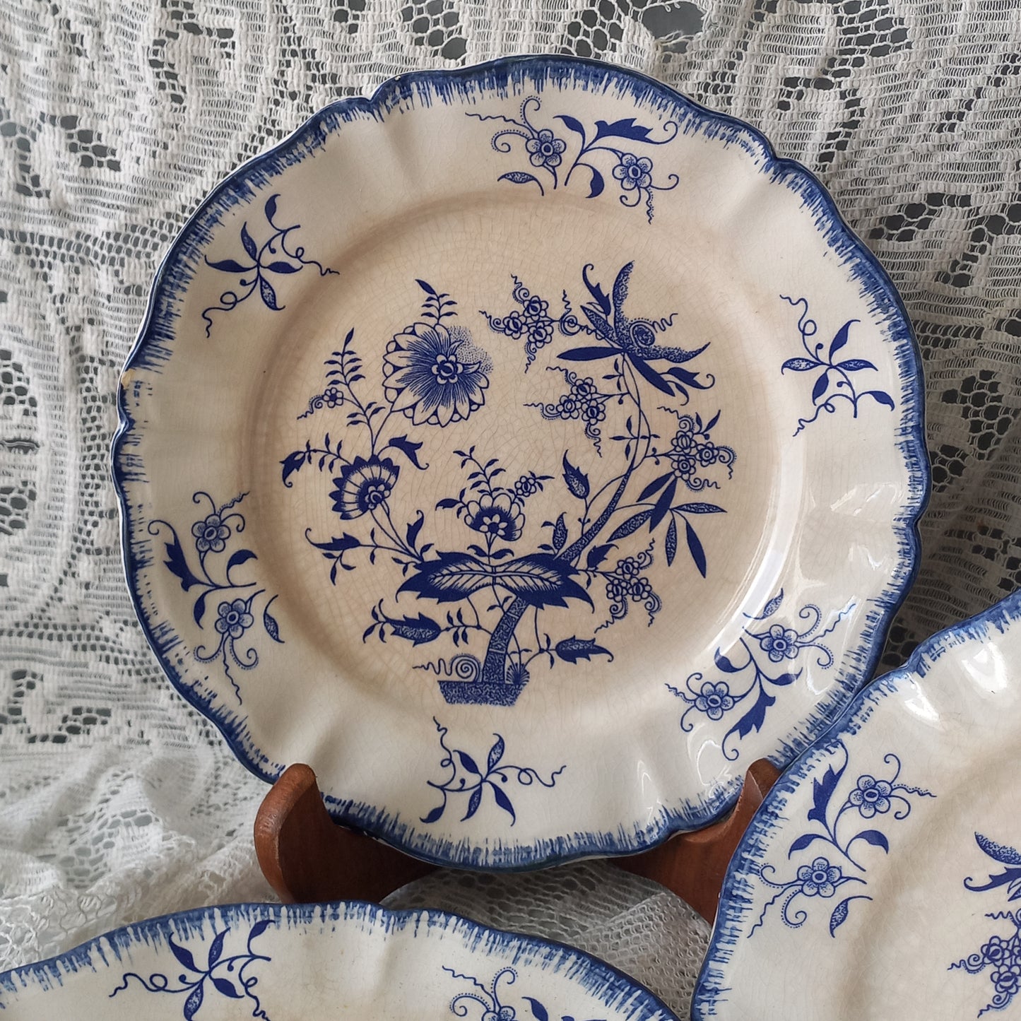 Small antique white ironstone plates with blue floral patterns from France