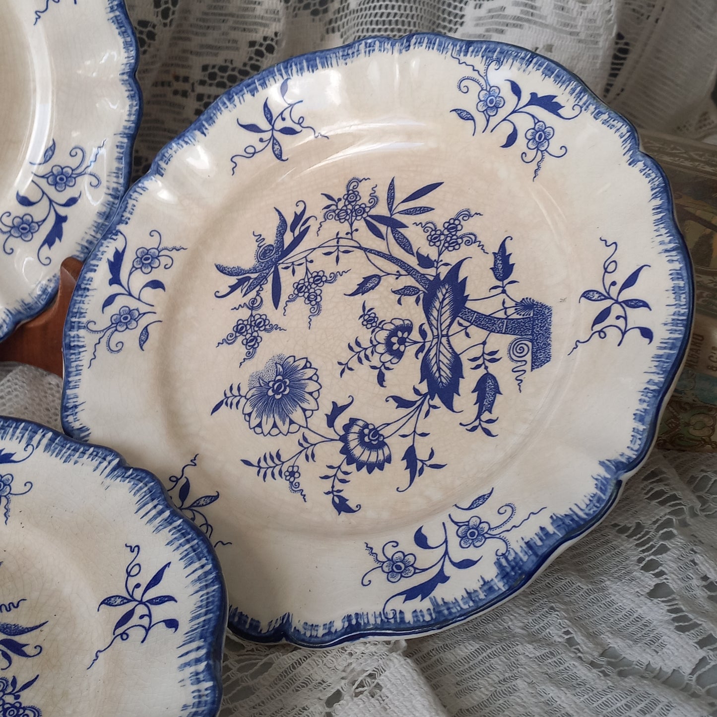 Small antique white ironstone plates with blue floral patterns from France