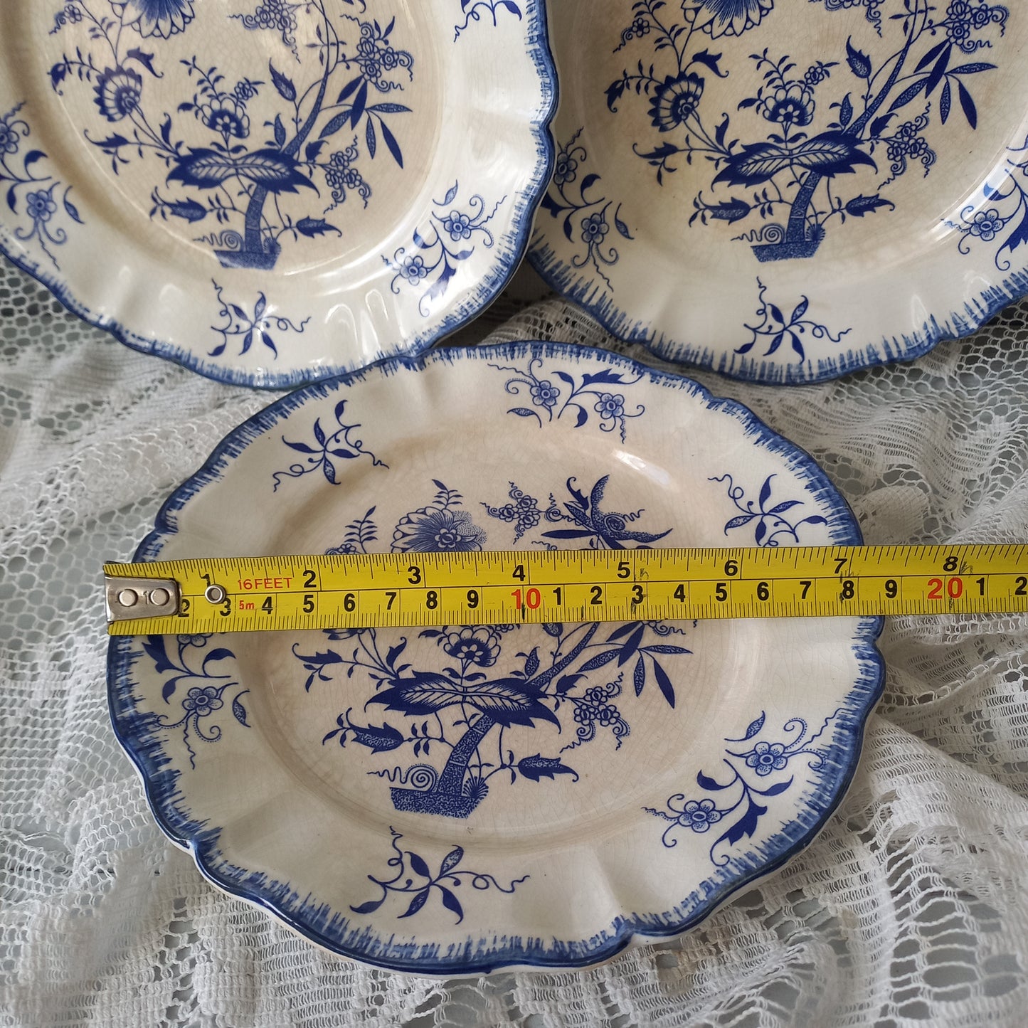 Small antique white ironstone plates with blue floral patterns from France